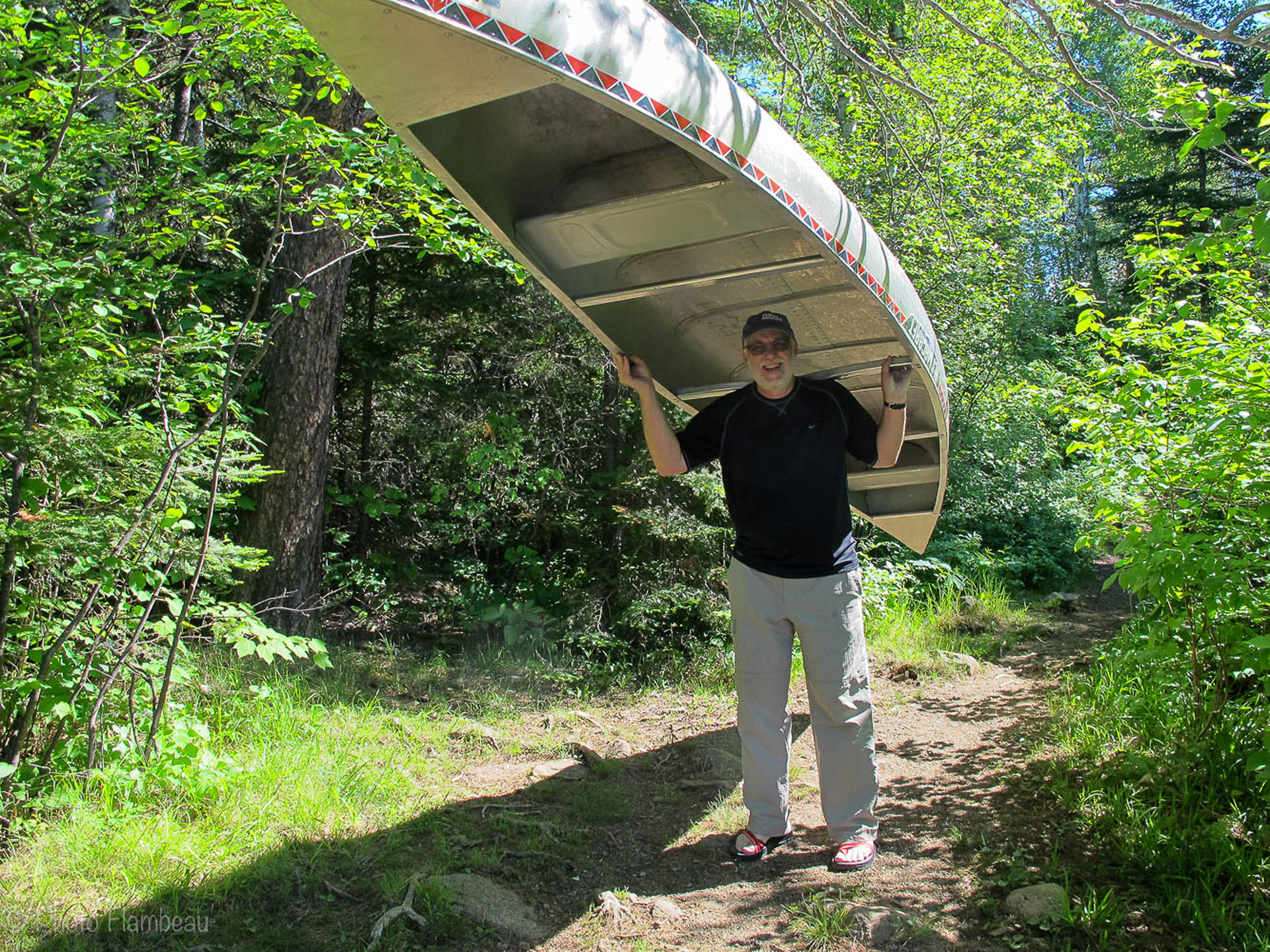 Jeff portaging the canoe