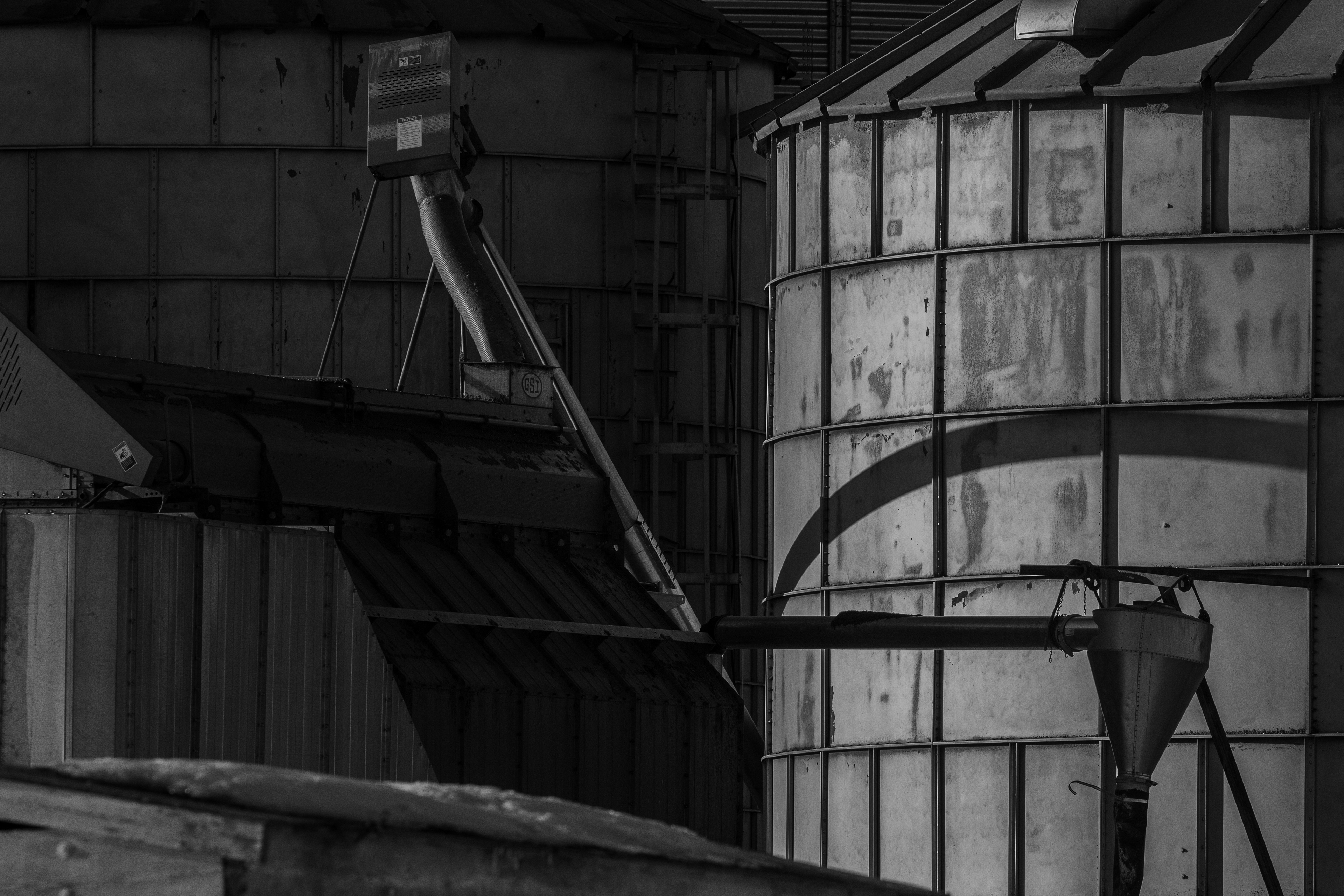 Grain Elevator in Shadows No. 2The Brinston Grain Elevator is a fascinating piece of construction. When the morning light hits these silos & elevators it creates something worth exploring & getting lost in.