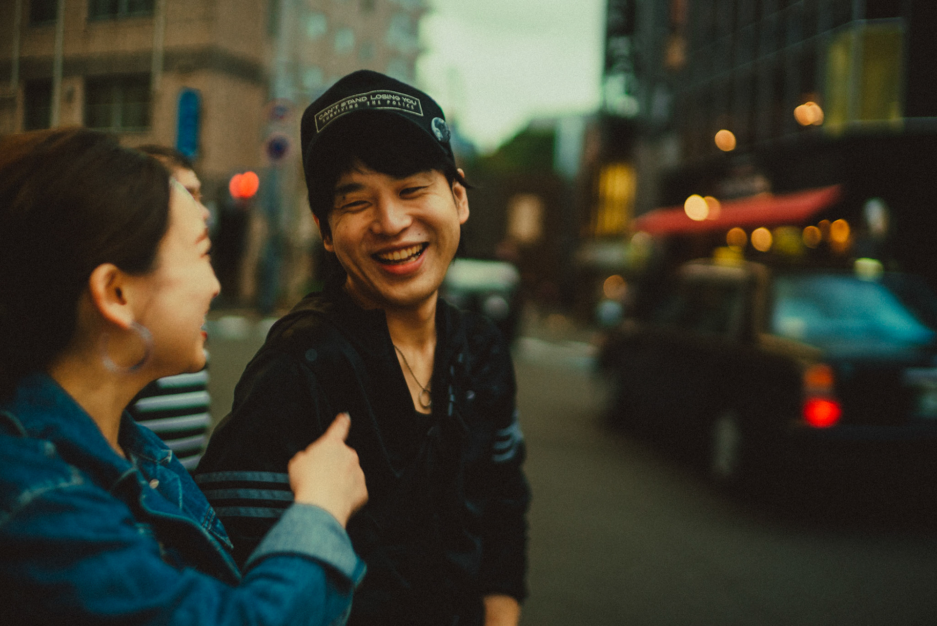 Street-style pre-wedding and engagement portraits along Kokutai-doro Avenue in Fukuoka, Japan, October 2018, Sony A7SII.