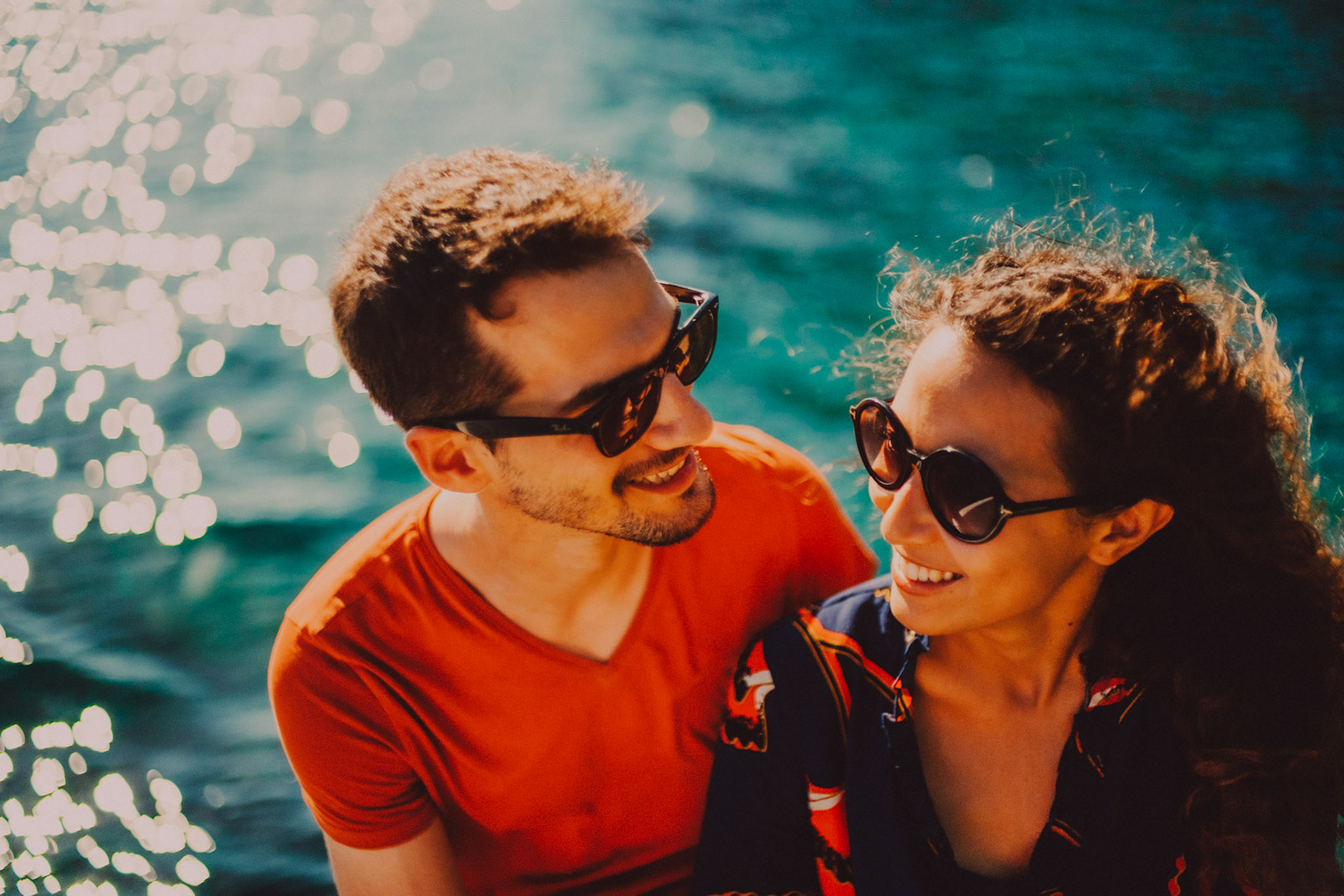 Couple portraits on a speedboat with turquoise blue water in the background, Cadlao Island, El Nido, Palawan, Philippines, Southeast Asia, April 2019, Sony A7III.
