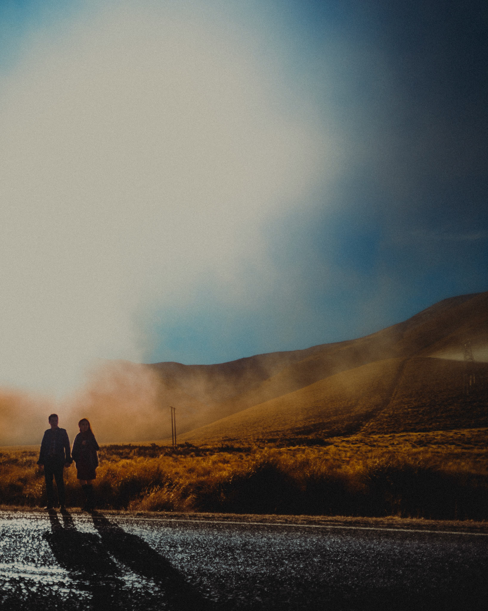 A moody engagement session beside a foggy hillside, New Zealand, June 2017, Leica M.