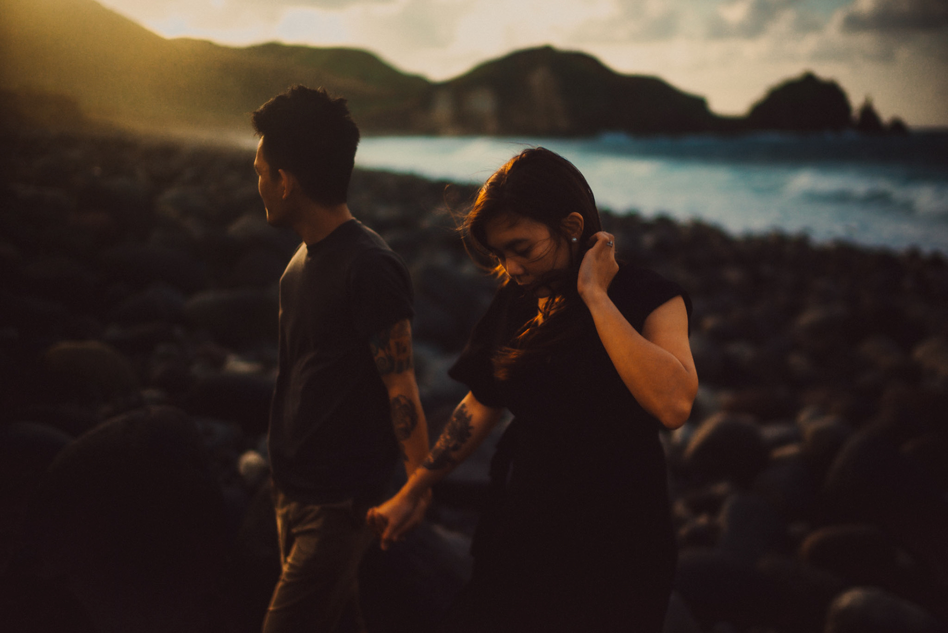 Moody and cinematic couple portraits from Owen and Nikka's adventure prenup photoshoot in Chadpidan Boulder Beach, Batanes, Philippines, October 2017, Leica M.
