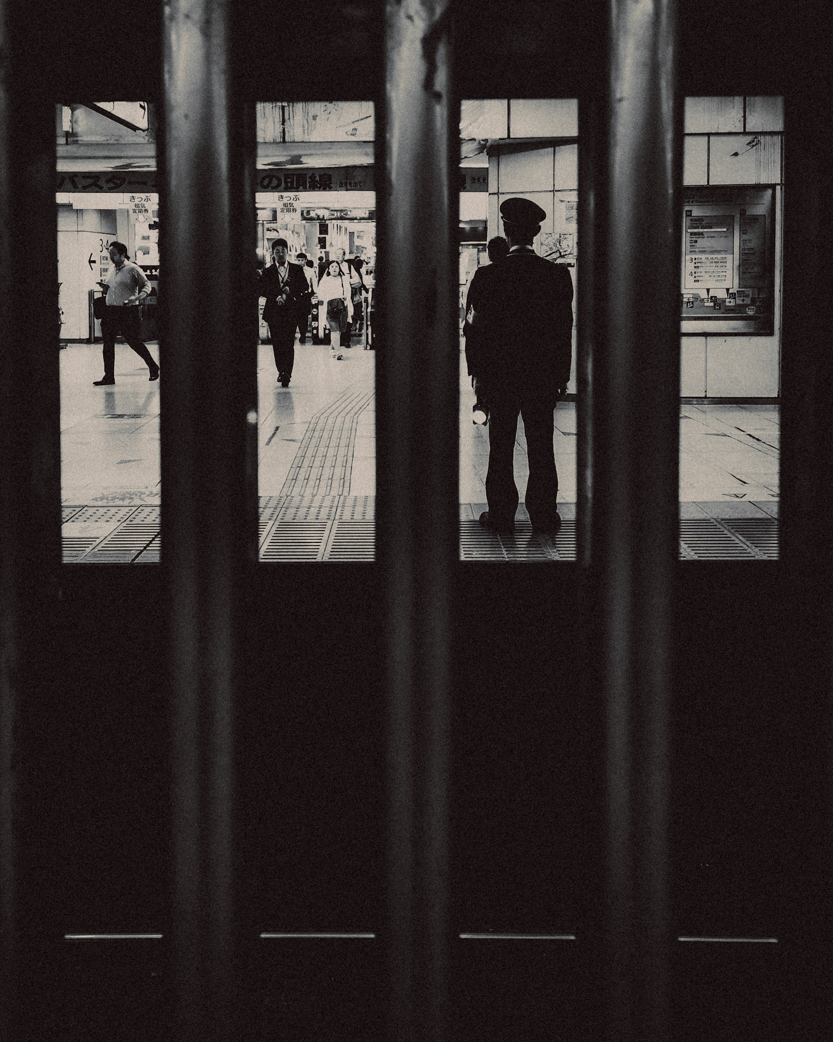 "Outside Looking In", in black and white, Shibuya Station, Tokyo, Japan, October 2019, Huawei P30 Pro.