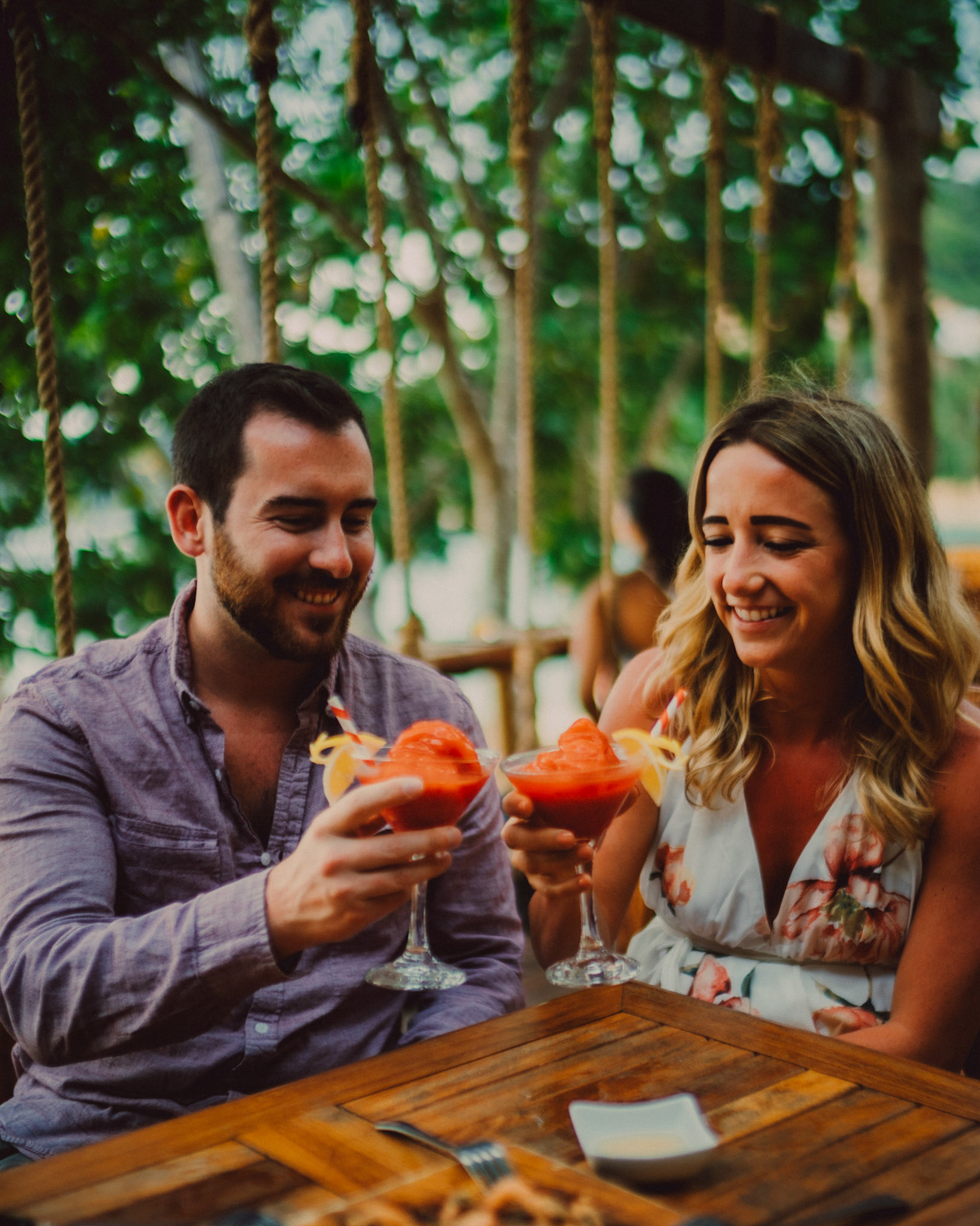 At Maremegmeg Beach Bar before their sunset engagement shoot in Las Cabanas, El Nido, Palawan, Philippines, Southeast Asia, March 2019, Sony A7III.