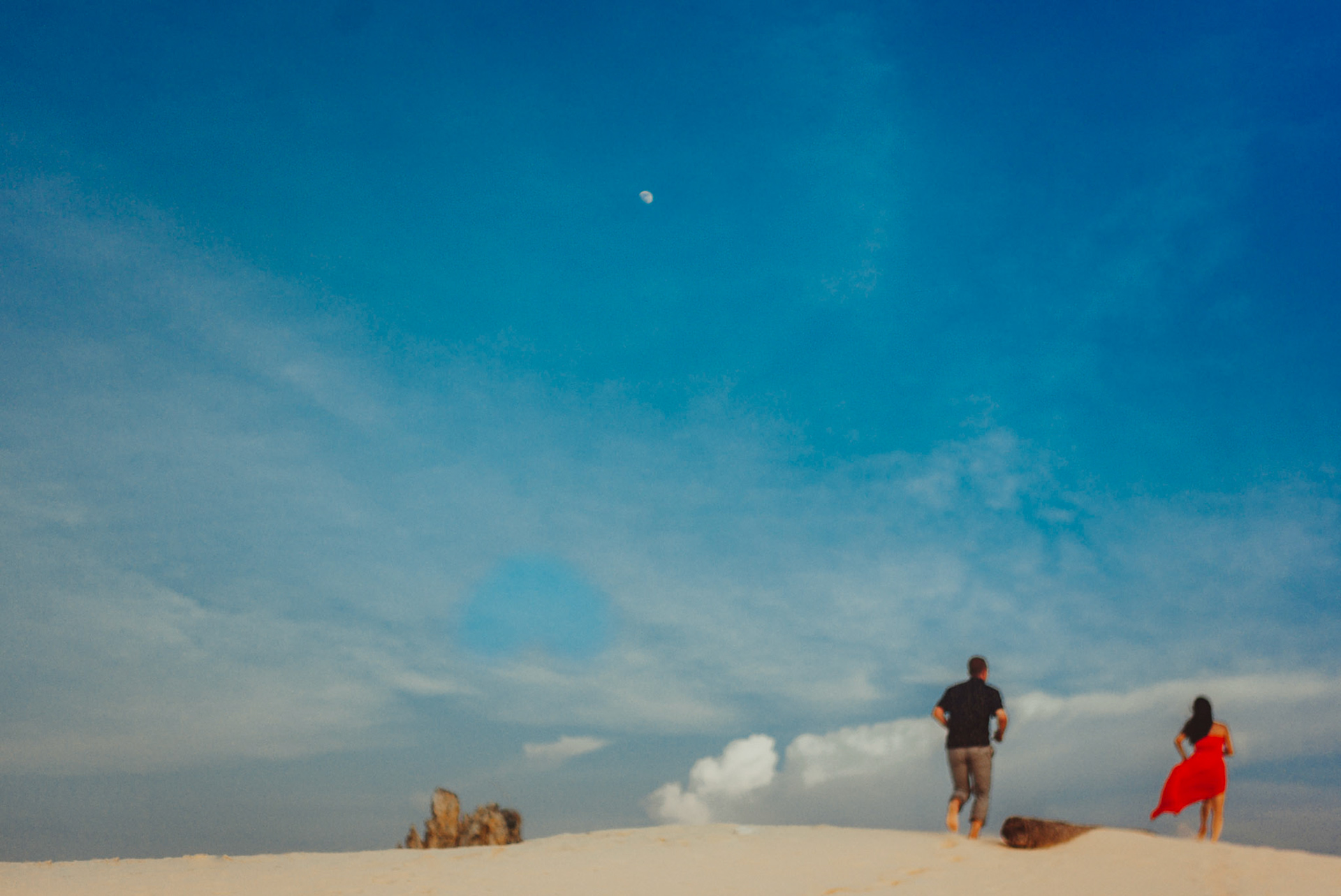 Chill couple portraits on a sand dune, from Renaud and Kat's island hopping adventure session in Malpagalen Island, Club Paradise, Coron, Palawan, Philippines, Southeast Asia, August 2018, Leica M