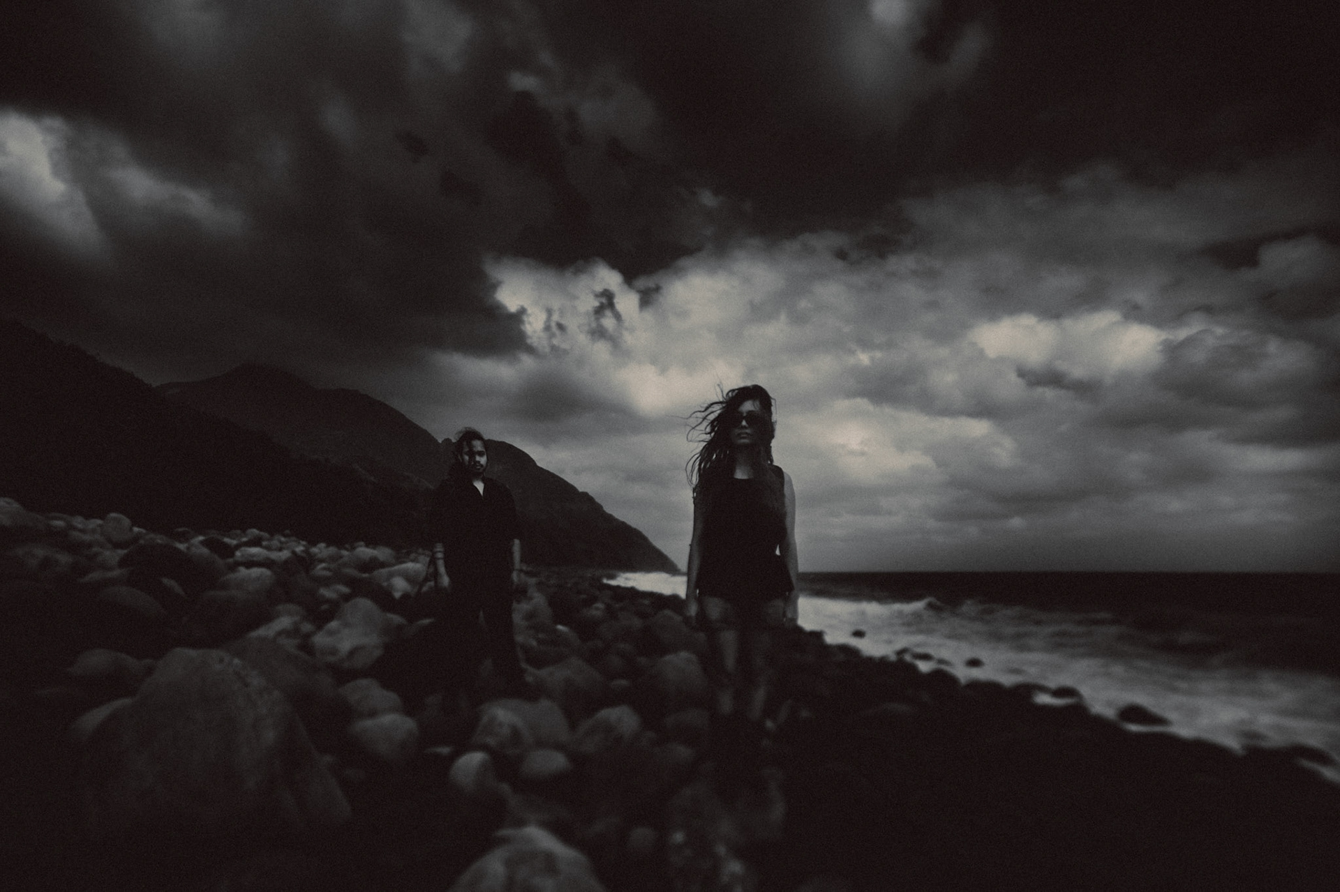 Moody adventure couple portraits in Valugan Boulder Beach, Basco, Batanes, Philippines, Southeast Asia, November 2014, Canon EOS 6D.
