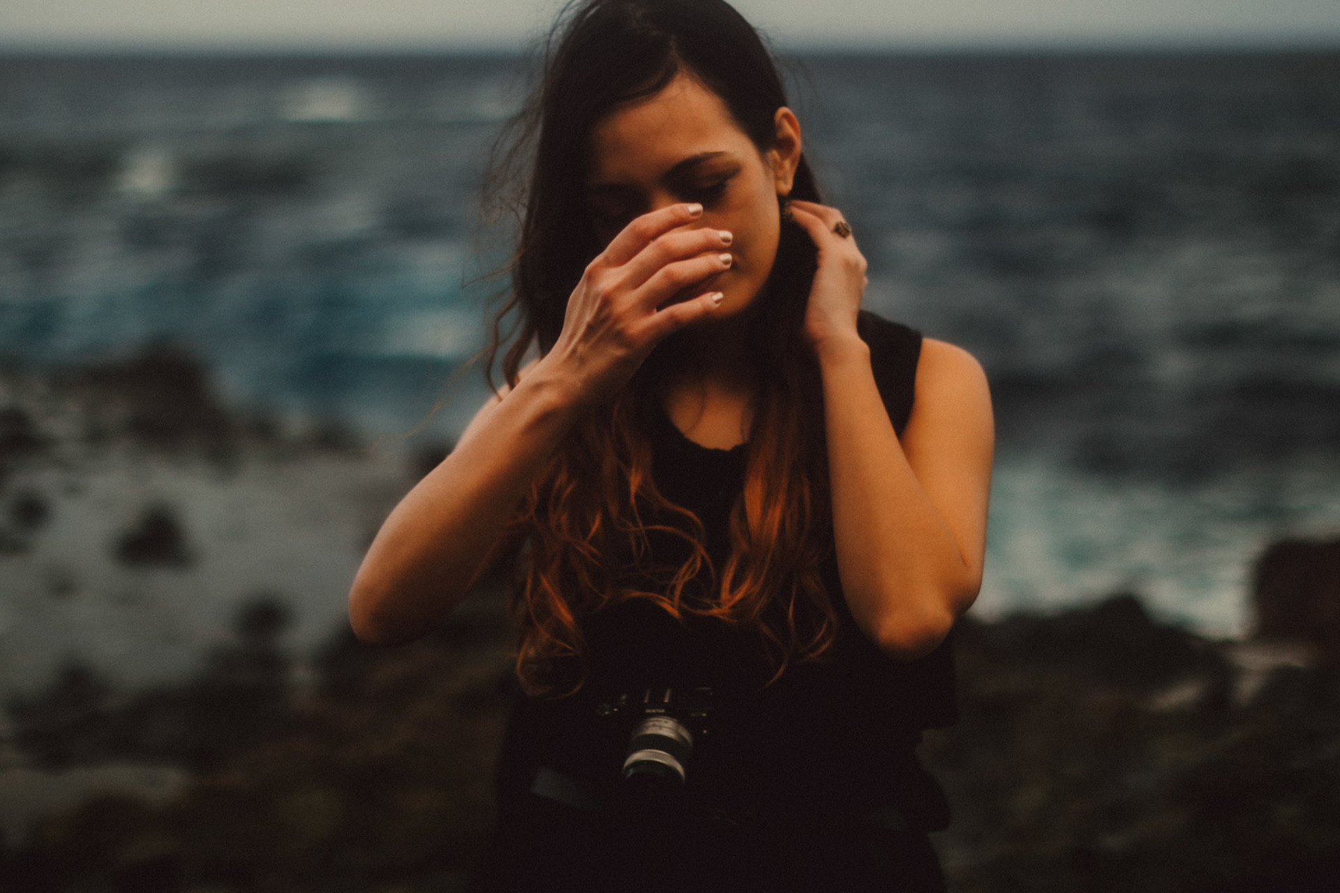 Johanna, moody portrait on a rocky coast below Chawa View Deck in Mahatao, Batanes, Philippines, Southeast Asia, November 2014, Canon EOS 6D.