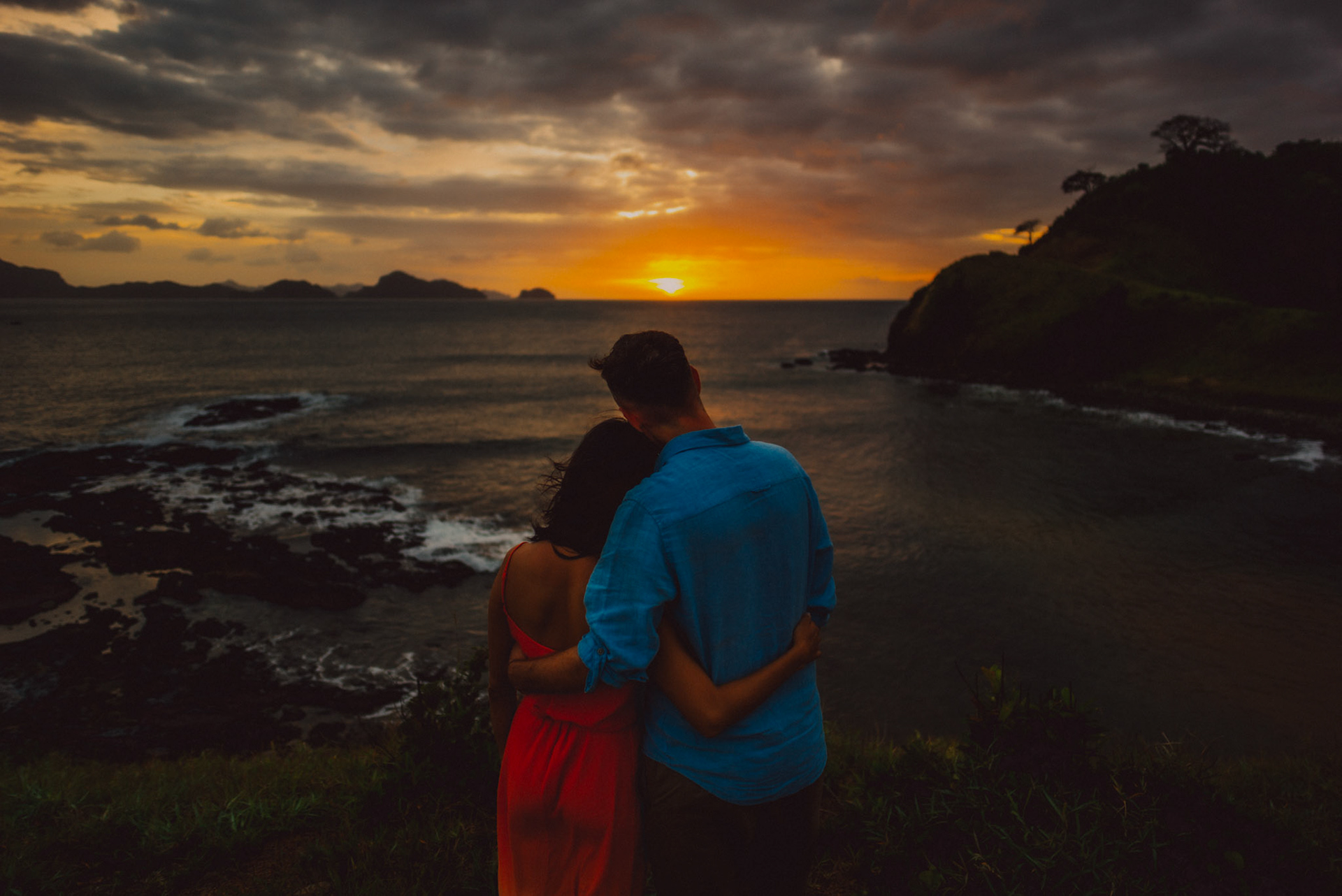 Moody sunset and blue hour couple portraits on a cliff overlooking El Nido Bay, Twin Beach beyond Nacpan, El Nido, Palawan, Philippines, Southeast Asia, January 2017, Leica M