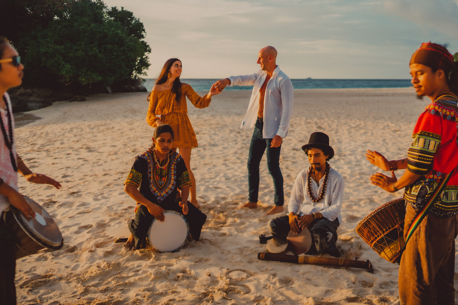 Candid couple portraits at Punta Bunga Beach, with a percussion ensemble at Crimson Resort and Spa, Boracay, Philippines, Southeast Asia, December 2018, Sony A7III.