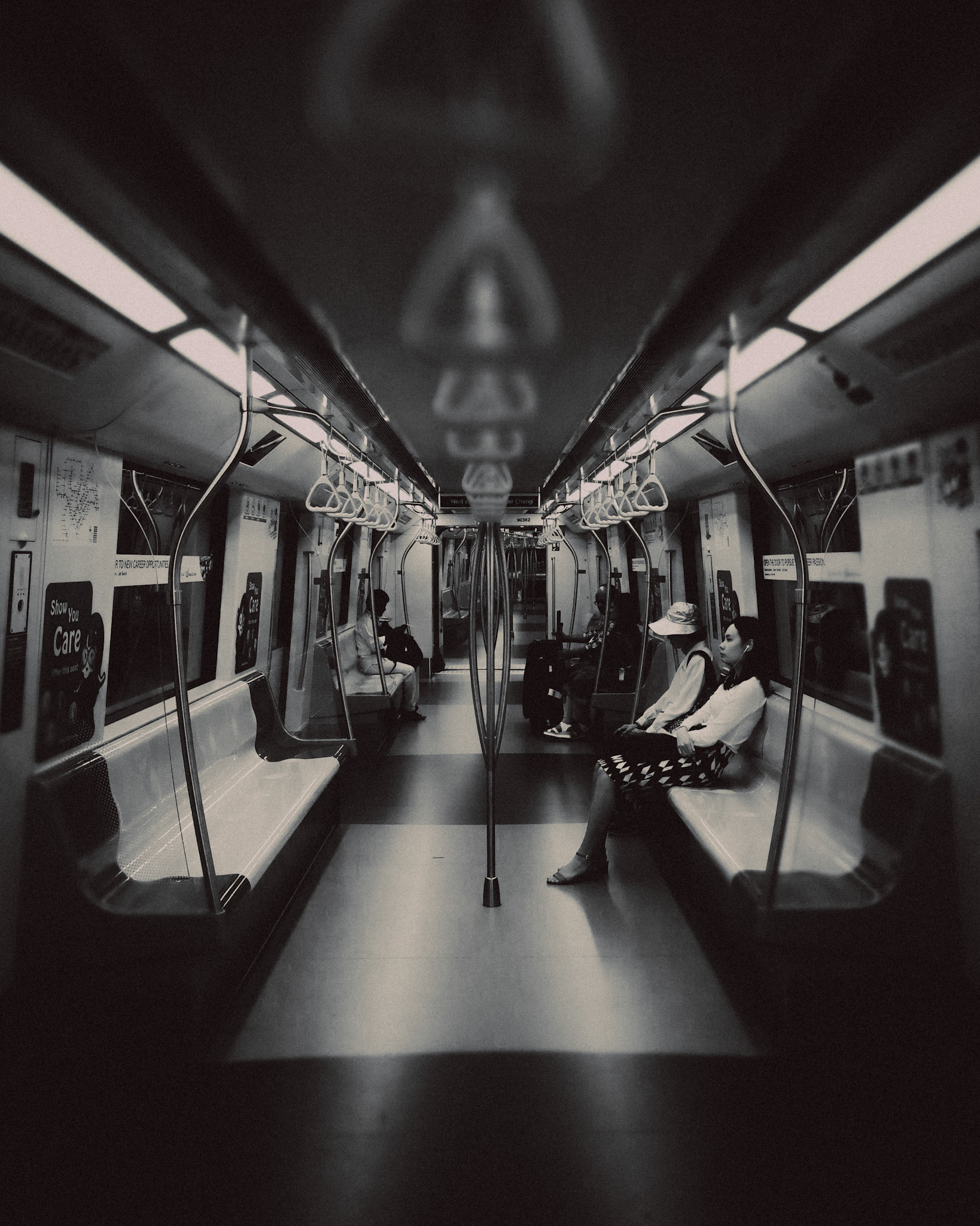 A black and white perspective photo of the Singapore MRT during off-peak hourse, Singapore, November 2017, Huawei Mate 9 Pro.