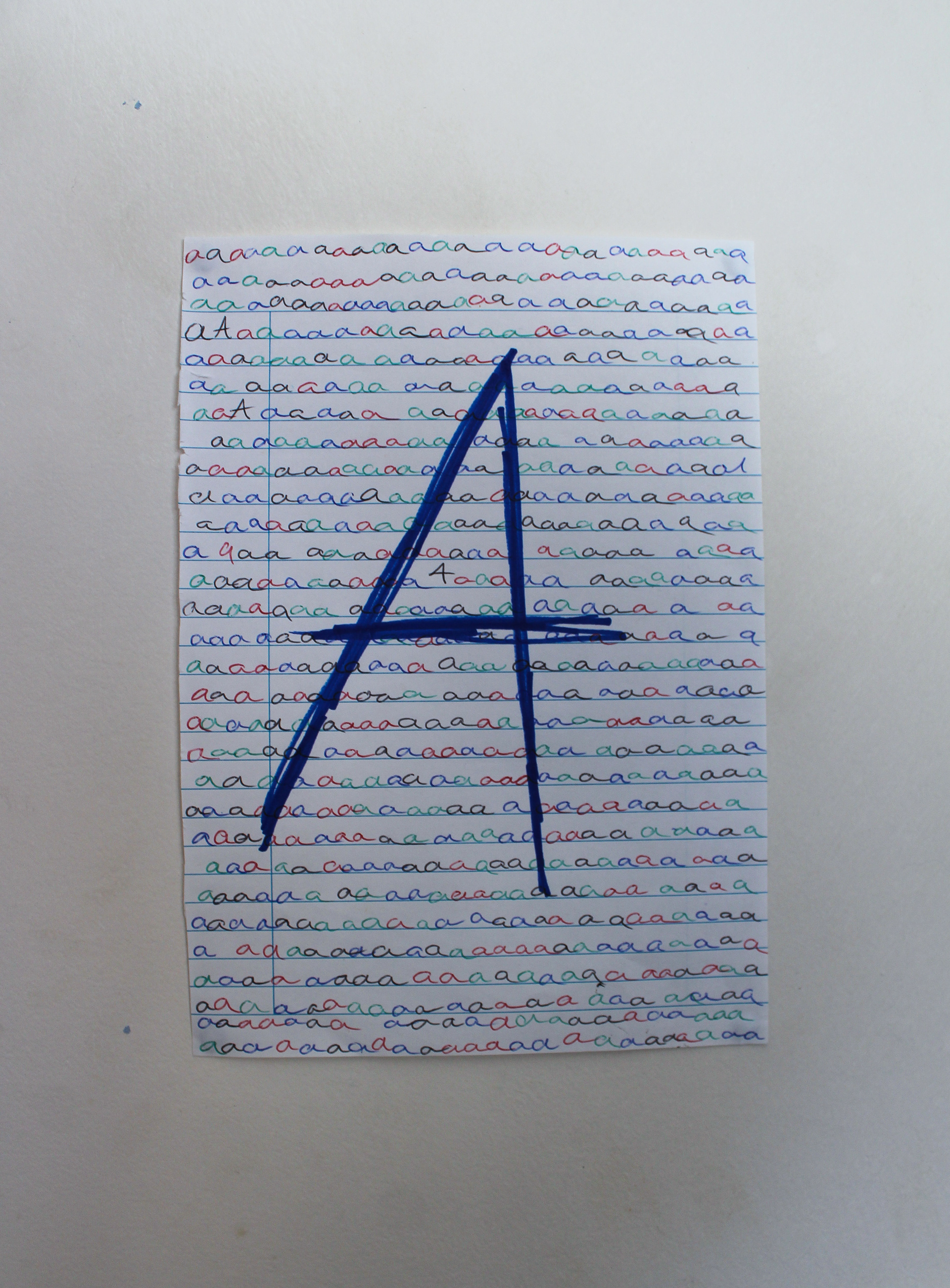 The E appears more sterile and cold, while the main A, and the ones behind it all have more movement and personality to them. You can feel more from the scribbled A than the typed E.