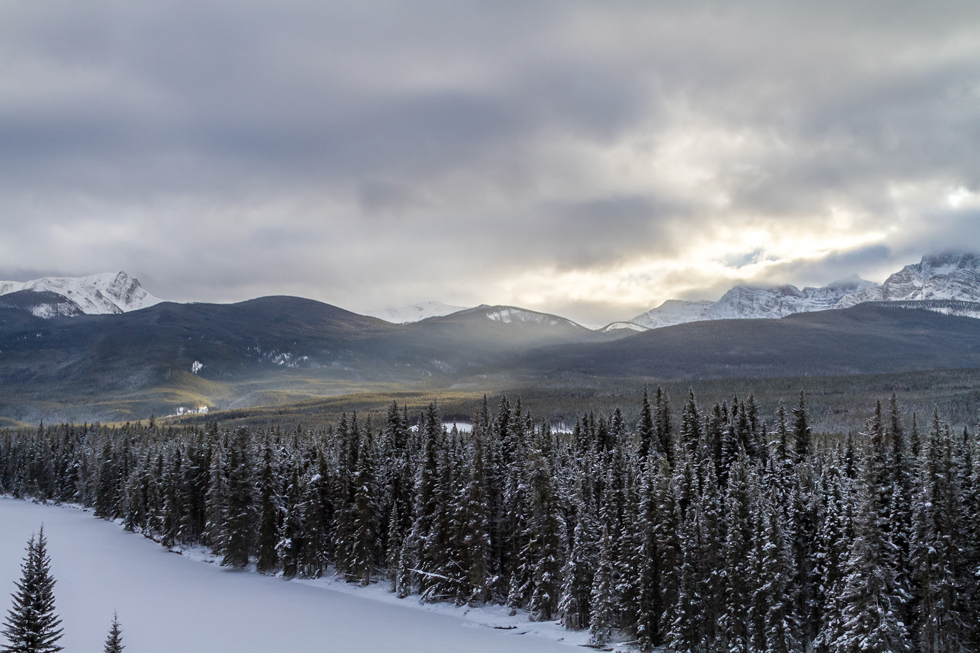 Ray of Sun popping through the afternoon clouds- Bow Valley Parkway