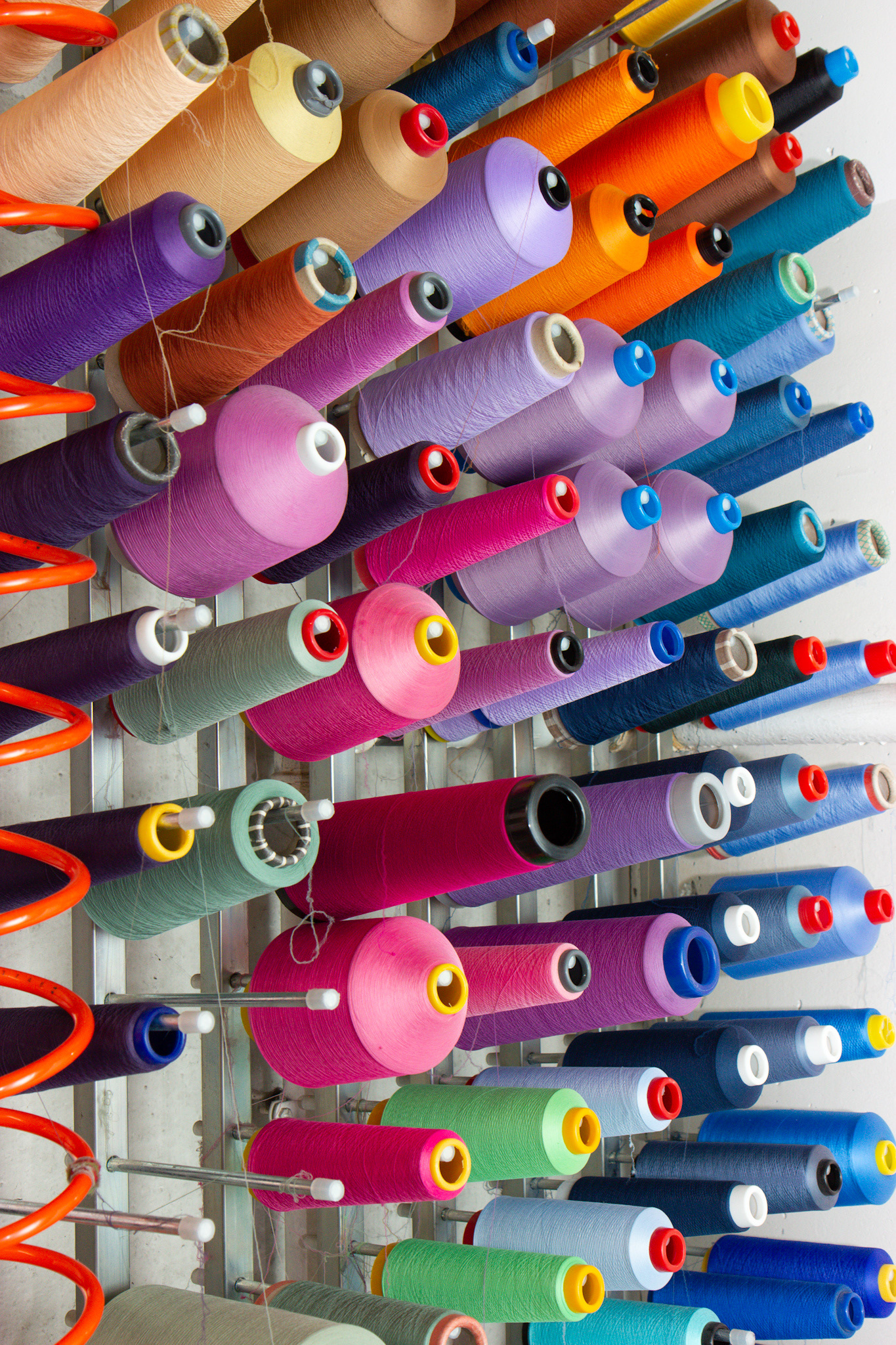 Socks warehouse production thread in Italy. © Stefania Calderara