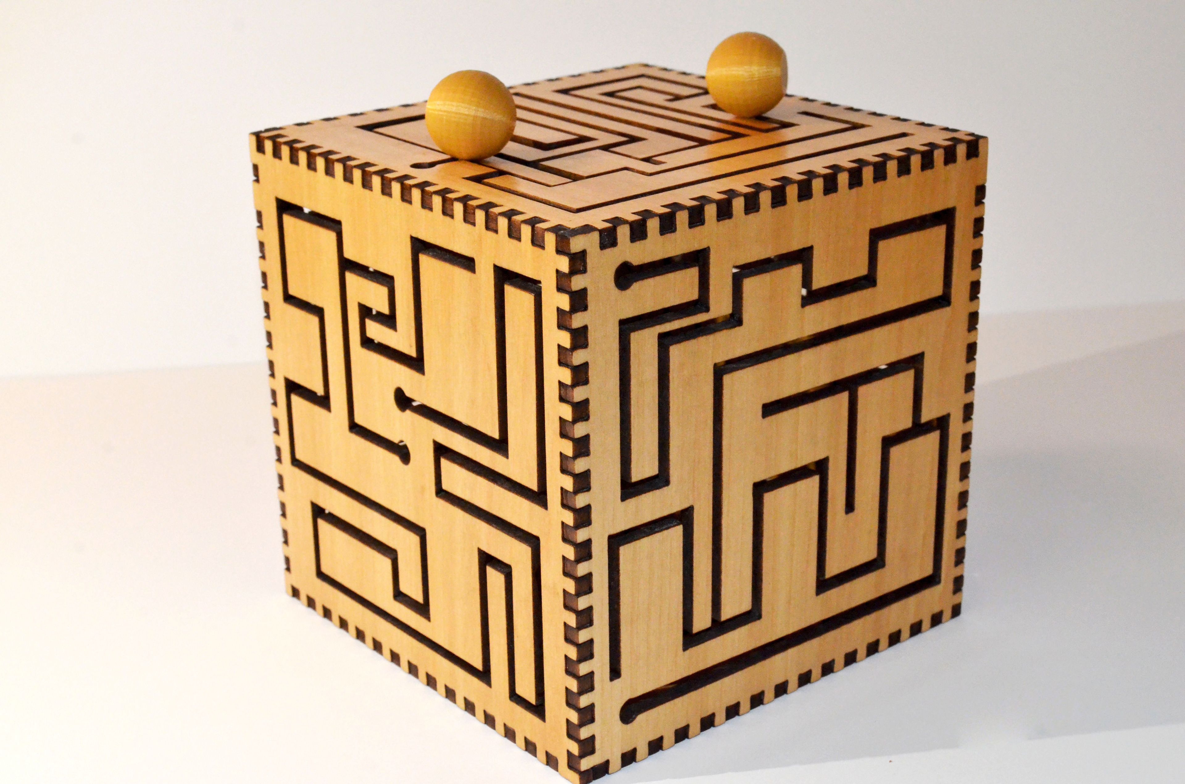 A puzzle box submitted for the Naef toy competition.