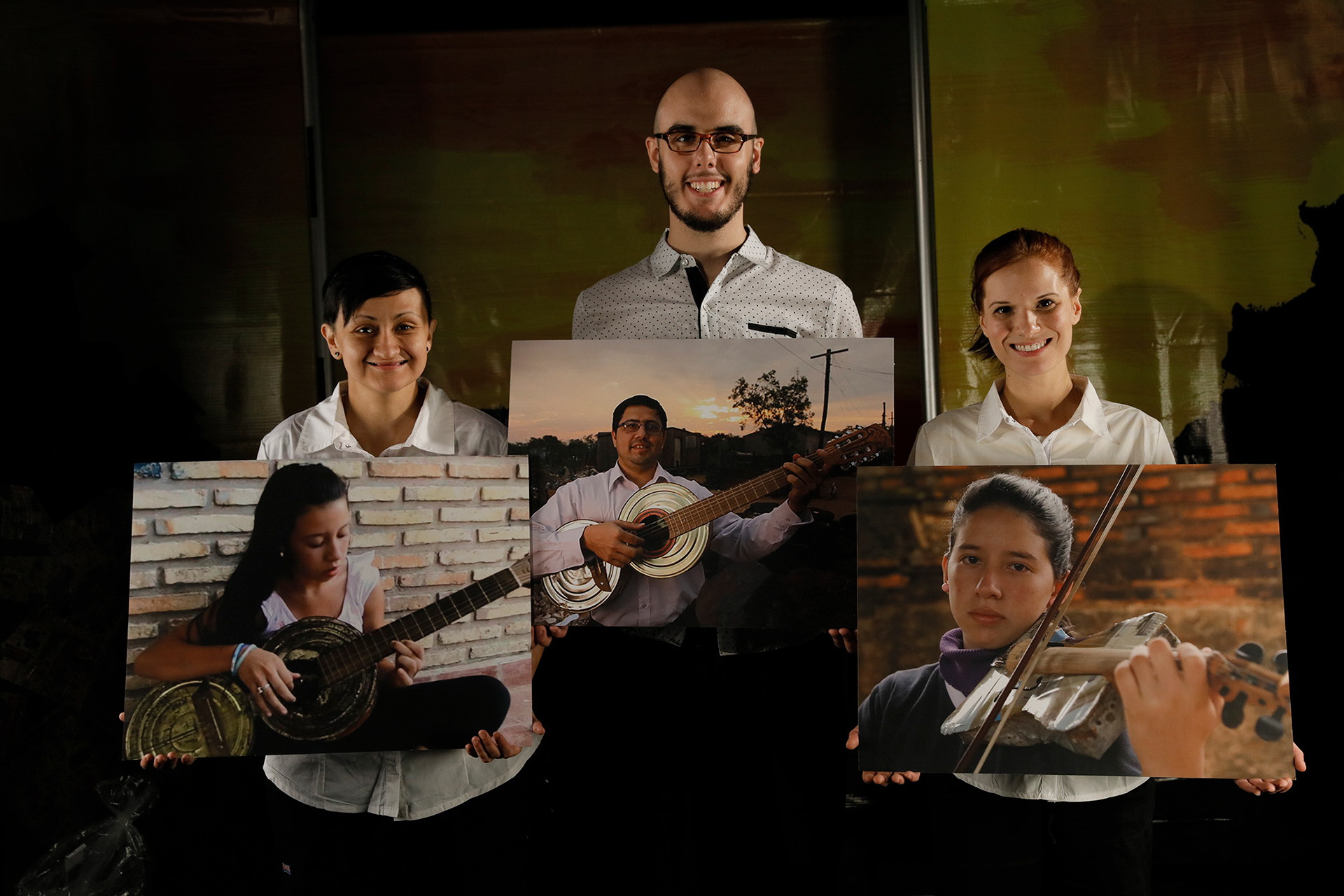 ADA'S VIOLIN : Images of the real Ada and the Recycled Orchestra (photo by Chris Bennion)