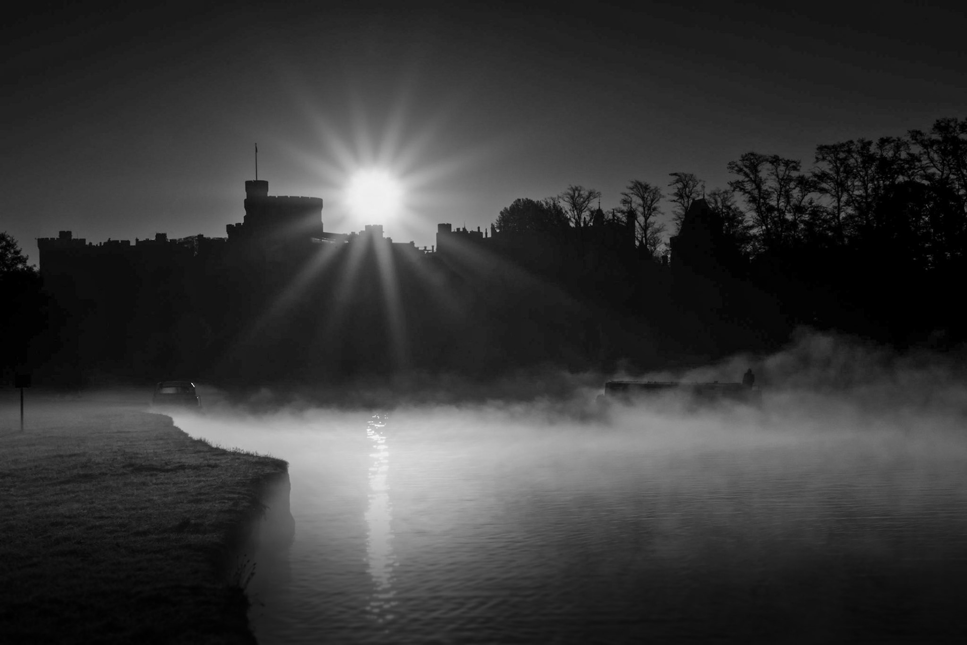 Sunrise at Windsor Castle and mist on the River Thames