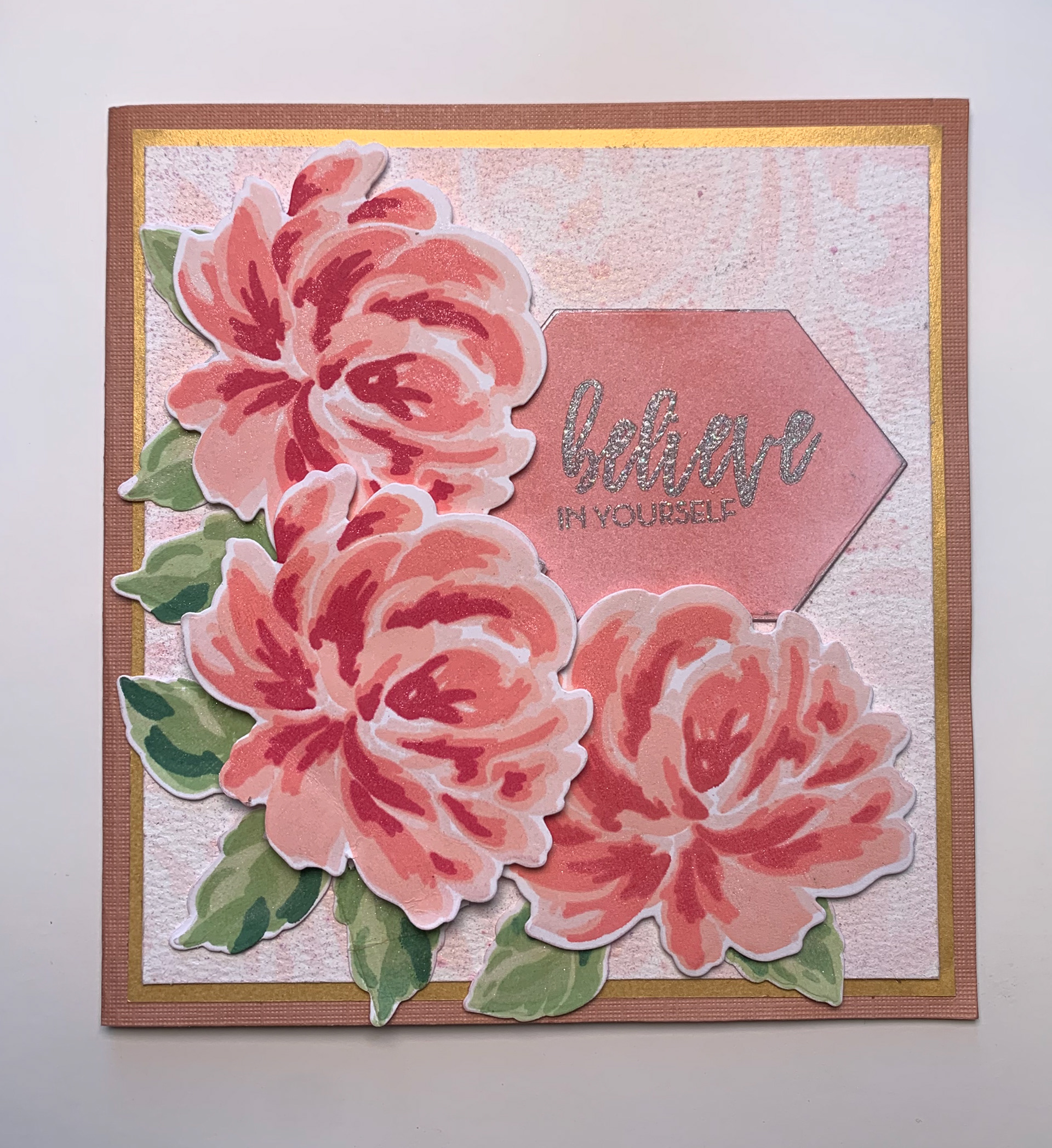 Stenciled and Airbrush background with multi layered stamp, embossing and small detail work.