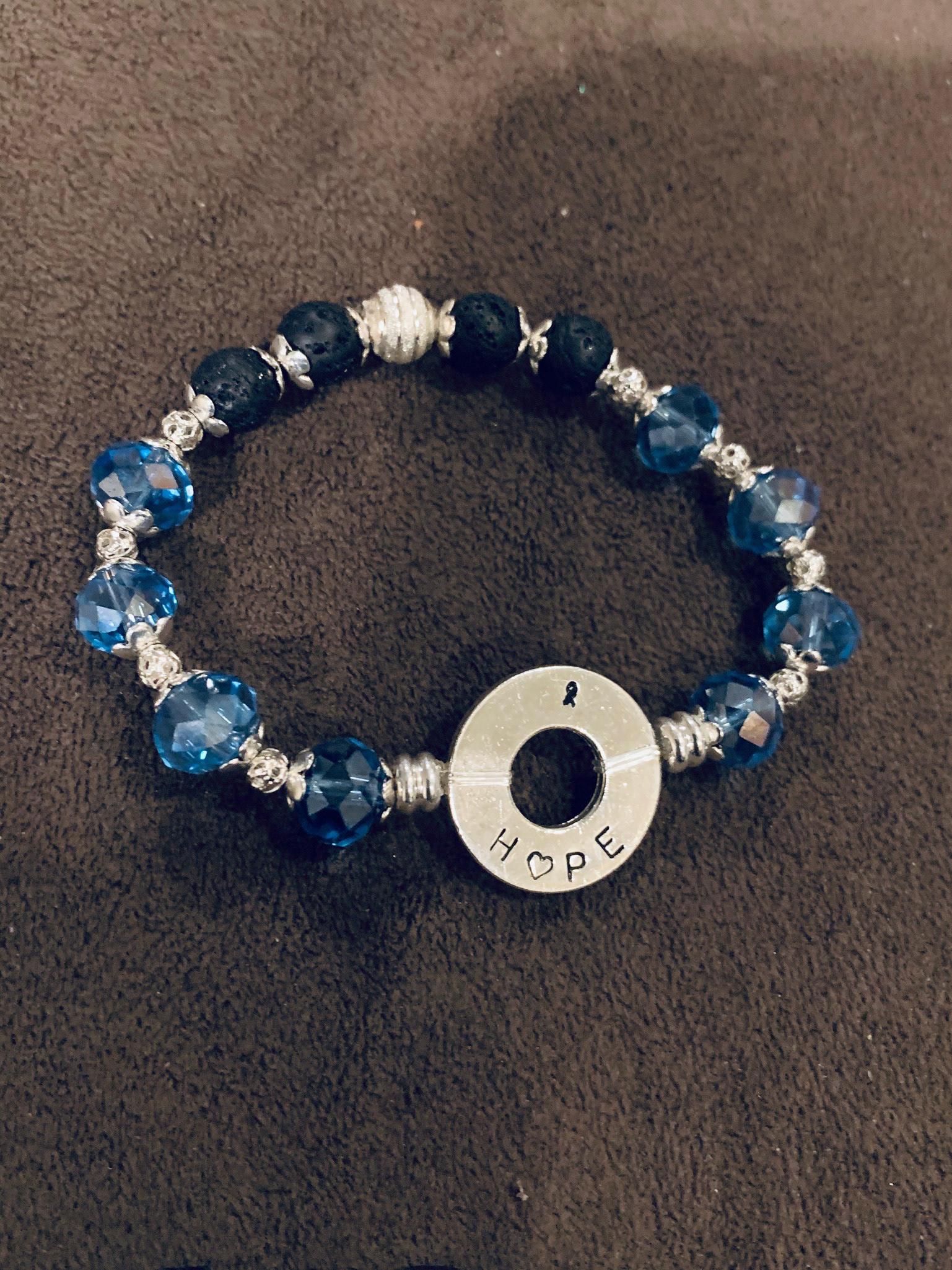 Swarovski Crystal, Lava Beads and silver plated toekn