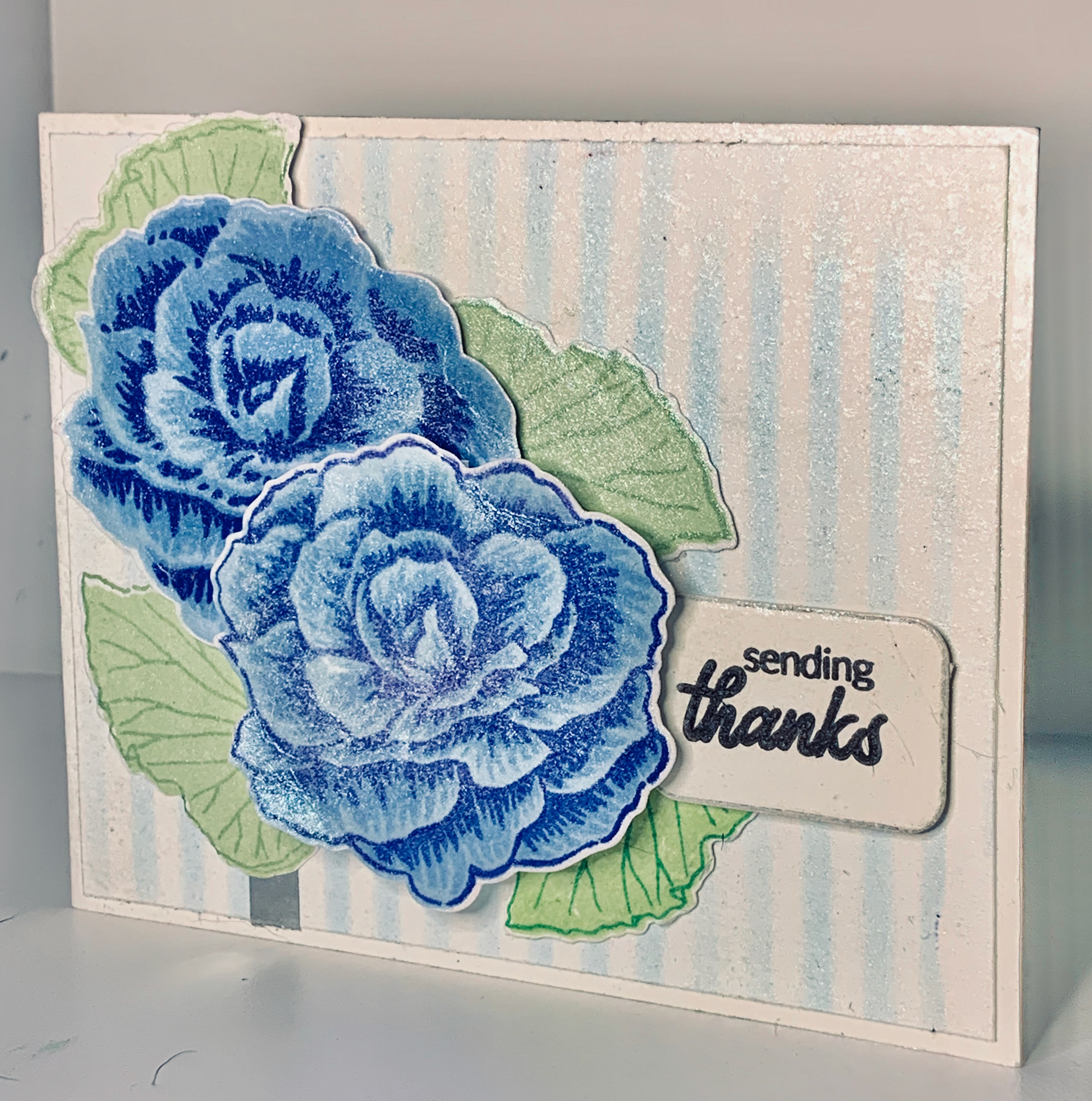Large 3d, multi stamped and diecut bloom.