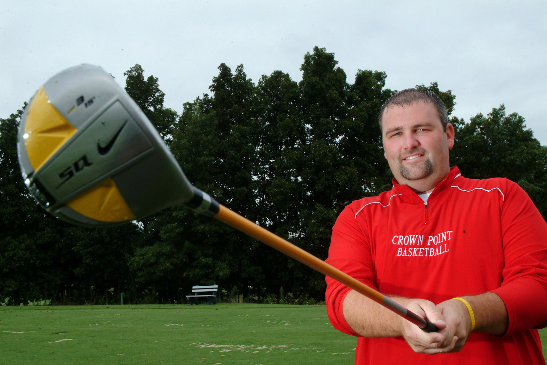 082309tvmGLFCRONKHITE_1 TONY V. MARTIN | THE TIMES VALPARAISO-Coach takes it to the hole. Crown Point High Schools Girl's Basketball coach Mike Cronkhite recorded a hole-in-one at the Lost Marsh Golf Course.