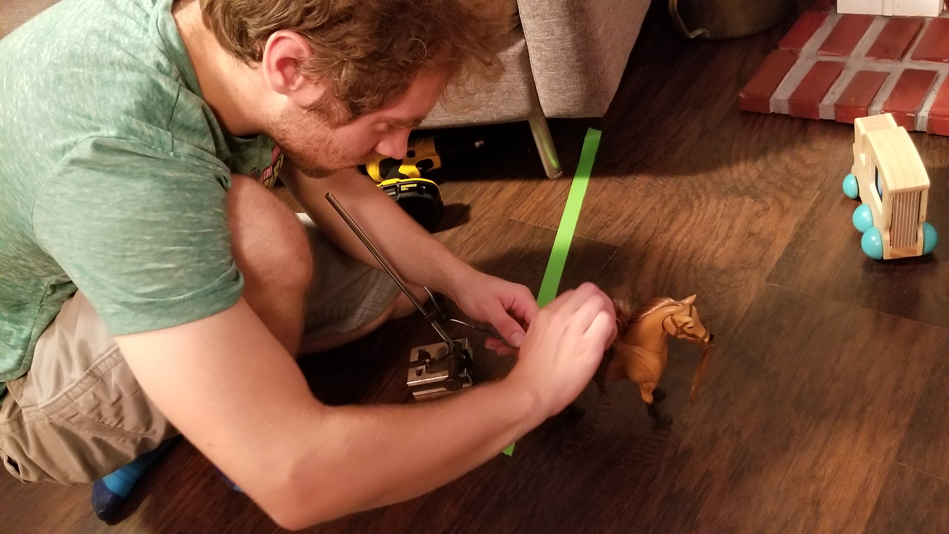 Russ Stepan double checking the rig to animate the toy horse.