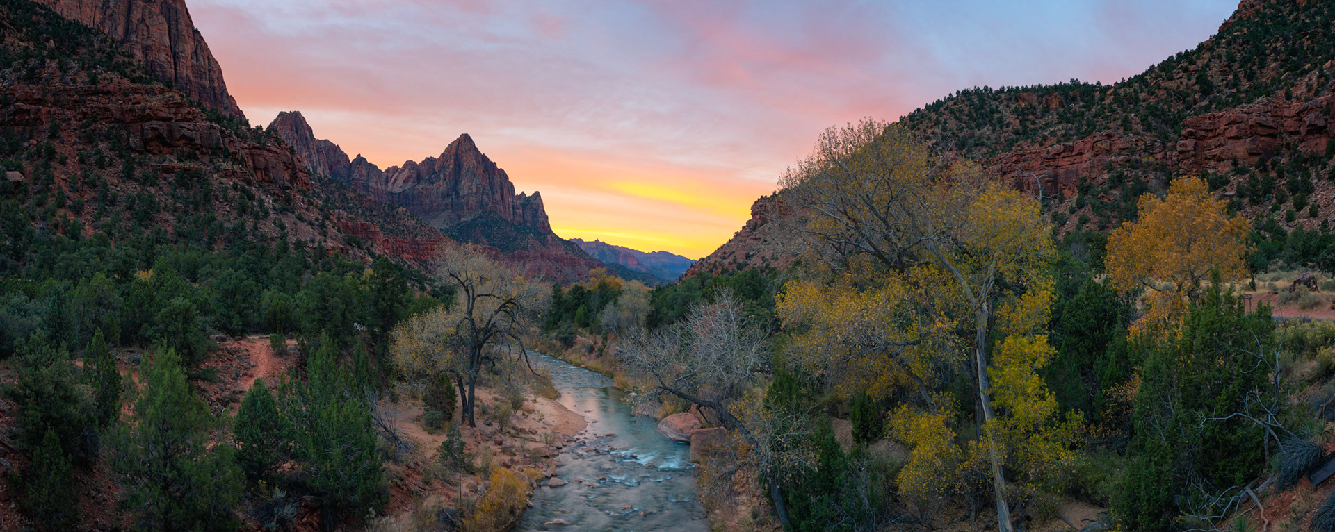 The iconic view of the Watchman from the bridge over the Virgin River, at sunrise.Zion National ParkUtahNovember 14, 2017This is a panoramic images consisting of 8 frames stitched in Photoshop. Additional processing in Lightroom and Photoshop.PENTAX K-1, HD PENTAX-D FA 24-70mm F2.8ED SDM WRISO 100 36 mm  1.3 sec at ƒ / 11
