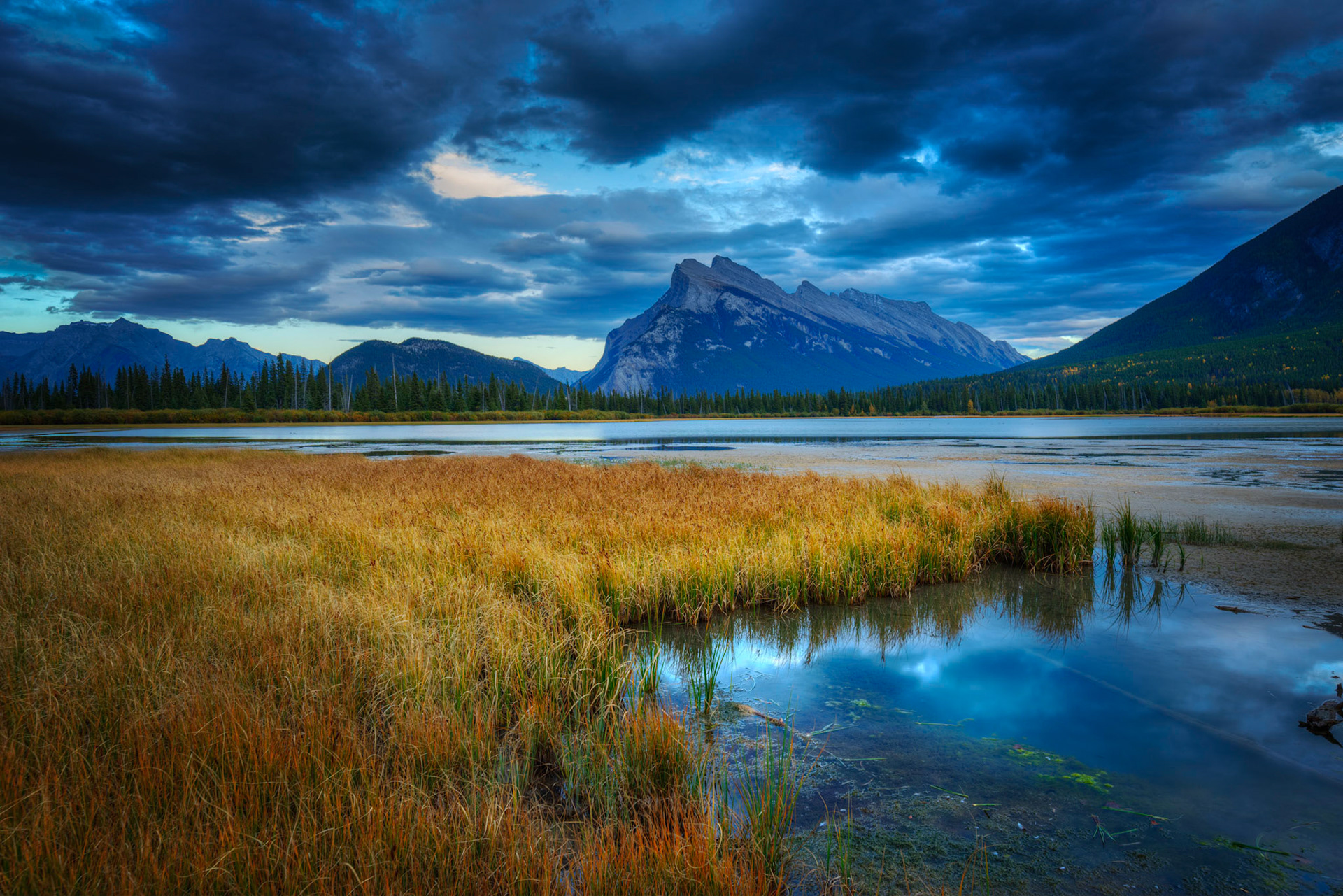 Mount Rundle, and the Vermillion Lakes, near susnet.Banff National ParkAlberta, CanadaSeptember 16, 2016This is an HDR image consisting of 5 exposures merged in Photomatix Pro. Additional processing in Lightroom and Photoshop.PENTAX K-1, HD PENTAX-D FA 15-30mm F2.8ED SDM WRISO 100 23 mm  ⅕ sec at ƒ / 11