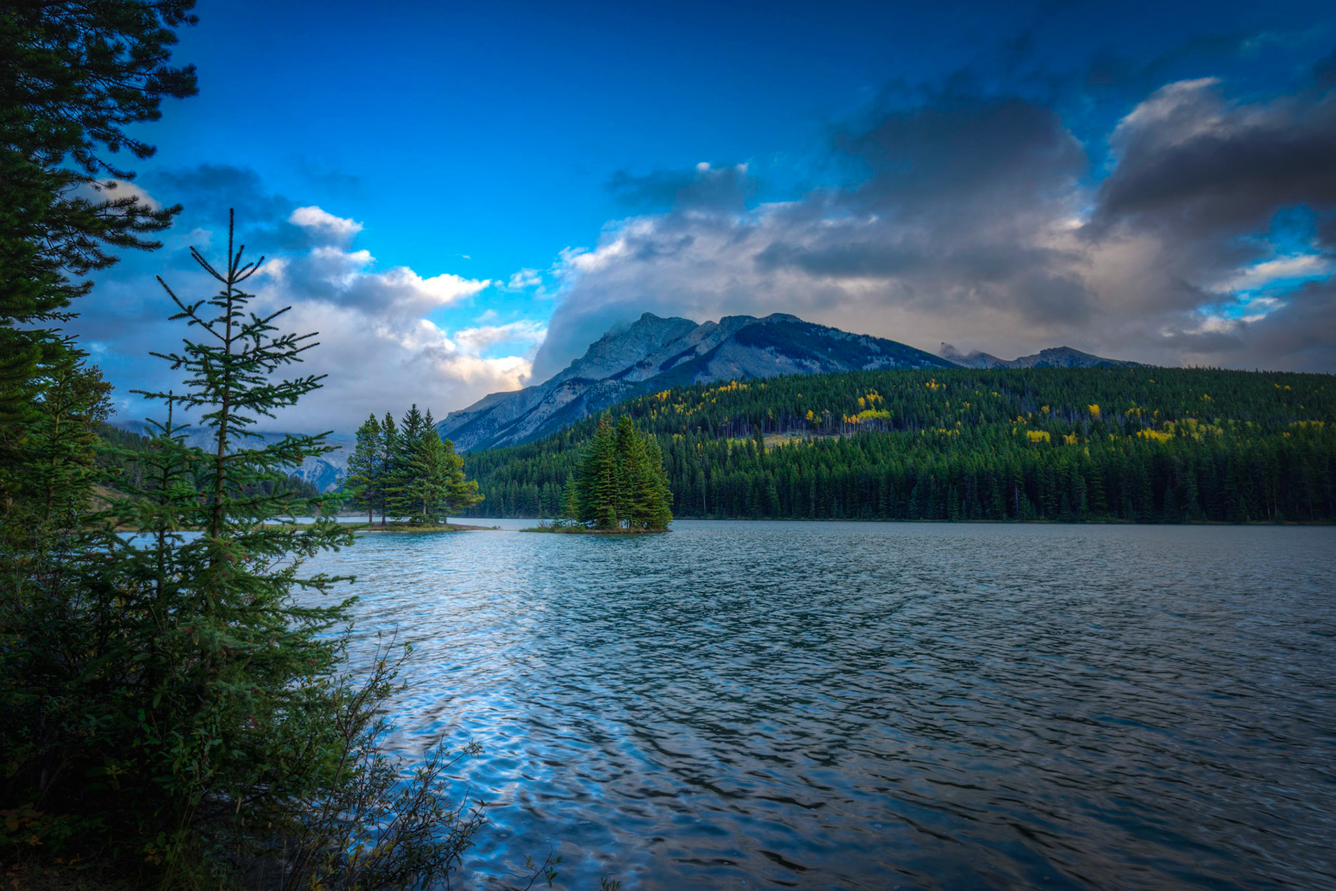 Evening of a mostly cloudy day at Two Jack LakeBanff National ParkAlberta, CanadaSeptember 17, 2016This is an HDR image consisting of 5 exposures merged in Photomatix Pro. Additional processing in Lightroom and Photoshop.PENTAX K-1, HD PENTAX-D FA 15-30mm F2.8ED SDM WRISO 100 16 mm  ⅙ sec at ƒ / 16