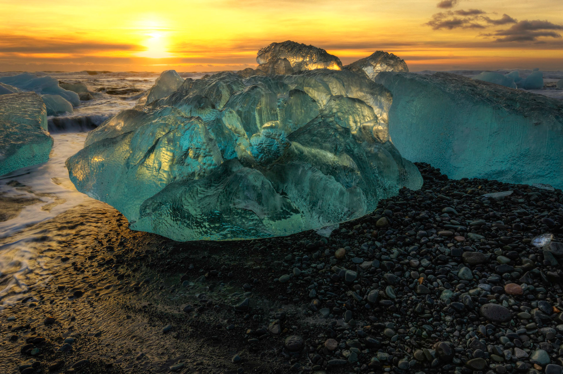 Sunrise at the ice beach at the outlet of Jökullsárlón.Austurland, IcelandFebruary 2, 2016This is an HDR image consisting of 5 exposures merged in Photomatix Pro. Additional processing in Lightroom and Photoshop.PENTAX K-3, Sigma 10-20mm f/4-5.6 EX DCISO 100 16 mm  ⅛ sec at ƒ / 18