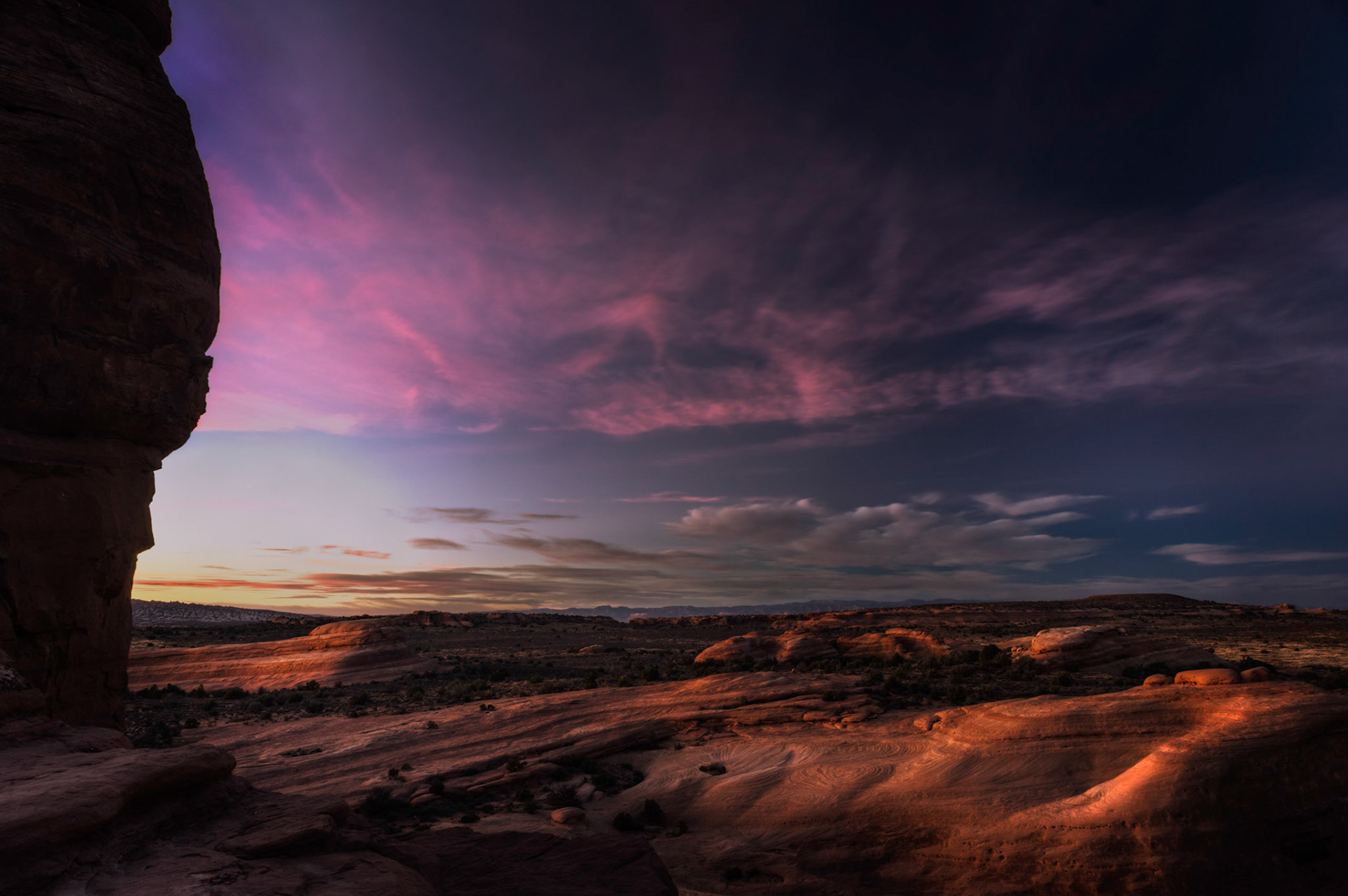 After sunset near Delicate Arch.  While the clouds over the arch itself weren't as nice as one could hope for, the clouds in the other direction were quite nice.Arches National Park6 November 2014This is an HDR image consisting of 5 exposures merged in Photomatix Pro. Additional processing in Lightroom and Photoshop.PENTAX K-3, Sigma 18-250mm f/3.5-6.3 DC OS HSMISO 100 18 mm  2.0 sec at ƒ / 11Prints of my work are available from my website at http://www.fingolfinphoto.comFollow me on Facebook at http://www.facebook.com/fingolfinphoto or http://www.facebook.com/pesterleAlso, http://500px.com/pesterle   http://www.flickr.com/photos/fingolfinphoto