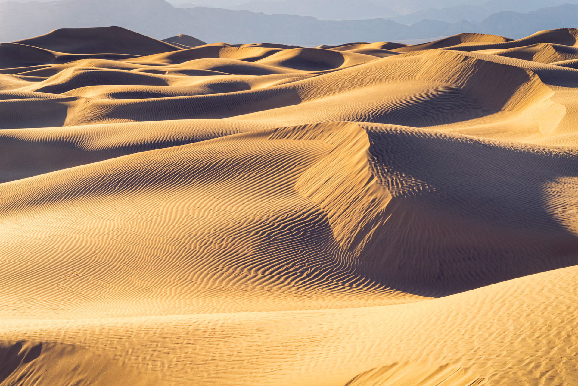 Mesquite Flats, late afternoon.Death Valley National ParkCaliforniaFebruary 20, 2020This is an HDR image consisting of 3 exposures merged in Lightroom. Additional processing in Lightroom and Photoshop.Pentax K-1, TAMRON 28-300mm F3.5-6.3 Ultra zoom XRISO 100 85 mm  ¹⁄₂₅ sec at ƒ / 22