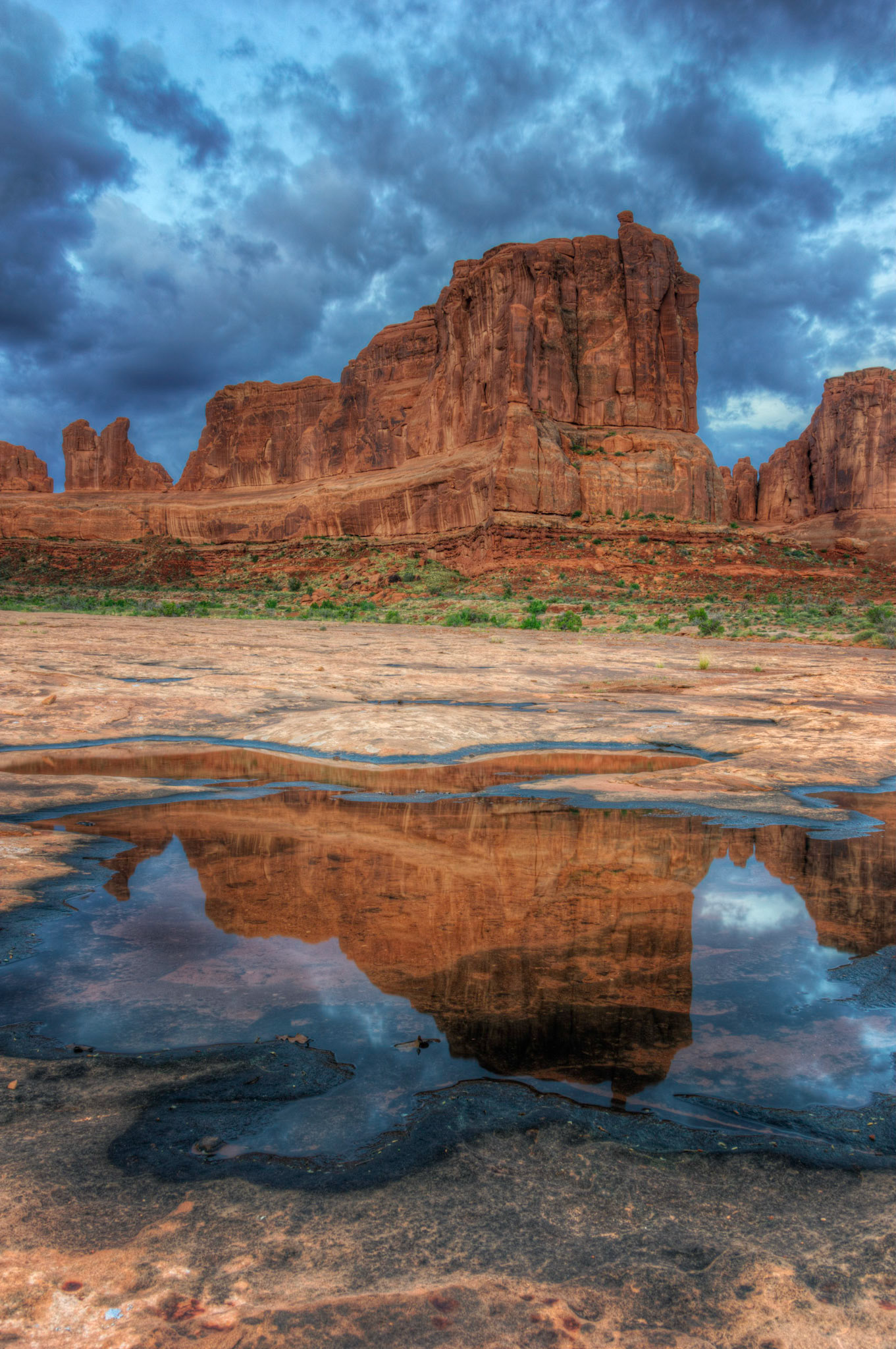Sunrise near the Courthouse Towers.Arches National Park19 May 2015This is an HDR image consisting of 5 exposures merged in Photomatix Pro. Additional processing in Lightroom and Photoshop.PENTAX K-3, Sigma 18-250mm f/3.5-6.3 DC OS HSMISO 100 18 mm  1.6 sec at ƒ / 11