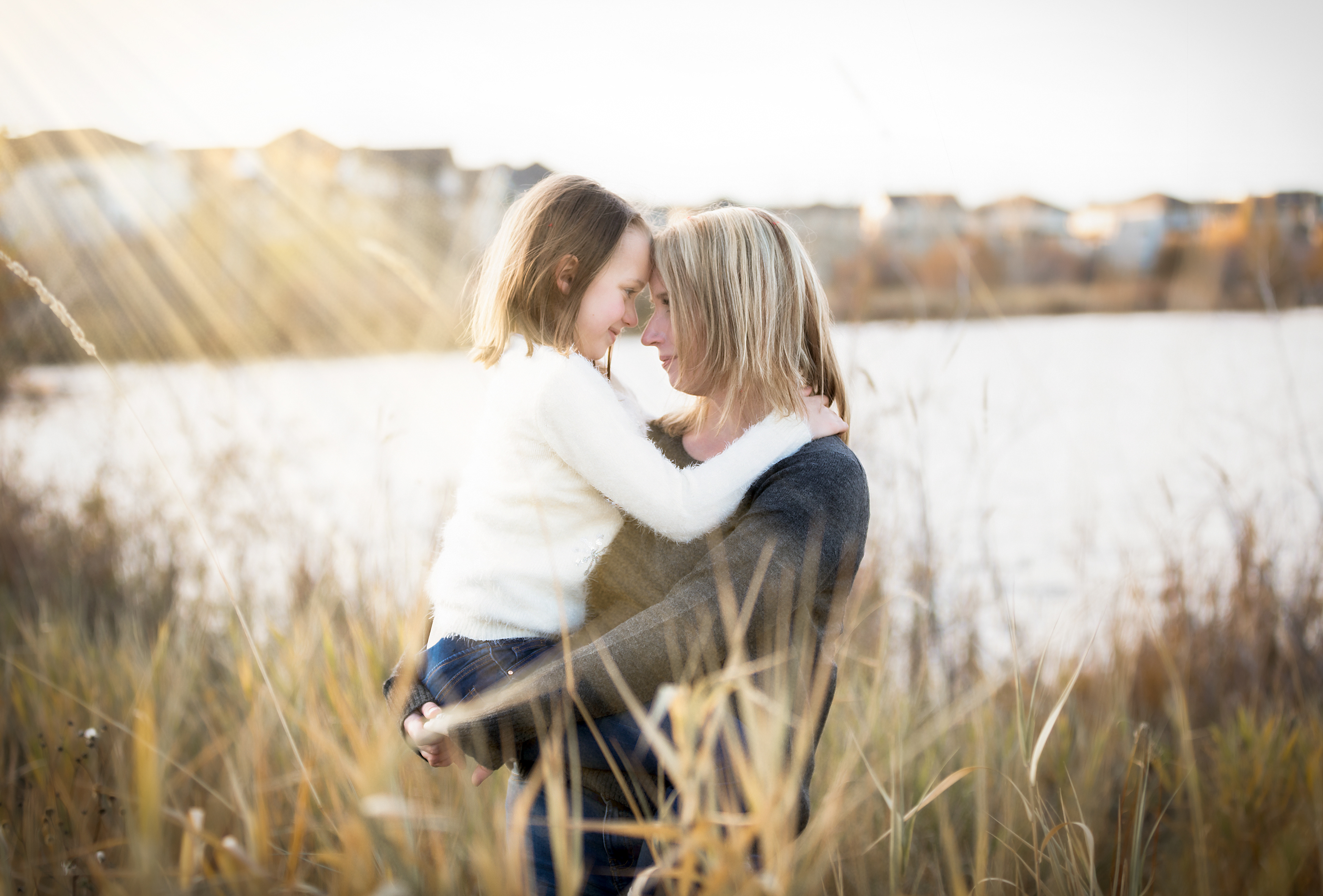 mom and daughter in sunshine