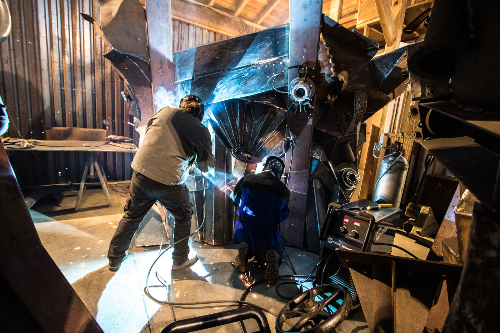 Joe Mross of Archive Designs welding a steel sculpture