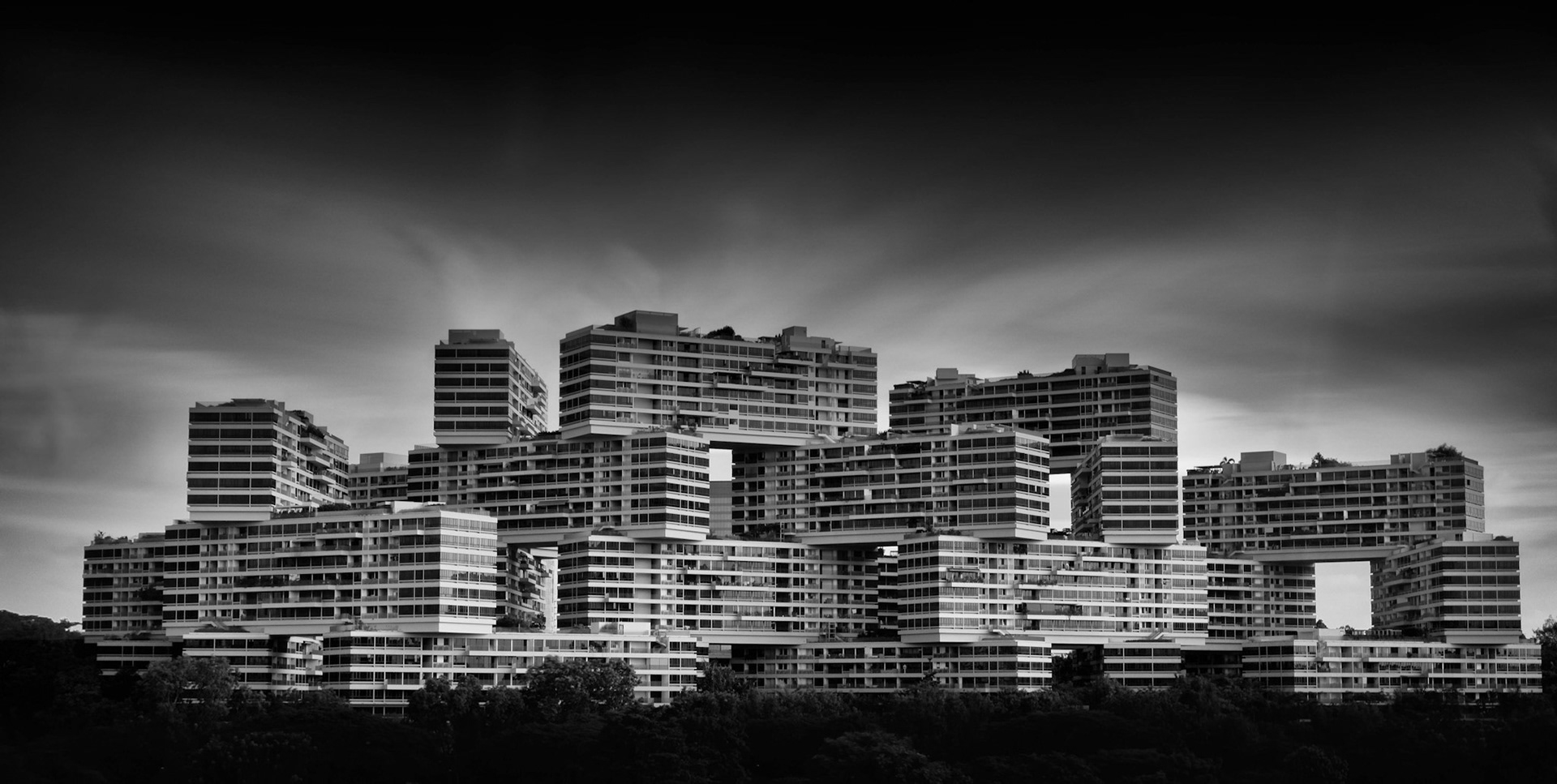 This photo is of The Interlace, a condominium in Singapore with some uniquely interesting architecture.I took this shot from a vantage point at Alexandra Central mall's car park (many thanks to Darren Soh who posted the tip on his Facebook page). It was the perfect environment to set up the shot: the car park was empty so I wasn't disturbed, there was a ledge where I could rest my tripod and gear, and it was sheltered from the heat. I could literally have stayed there all day if I wanted to. As it happens though, I was happy with the first shot I took so I left again relatively quickly!