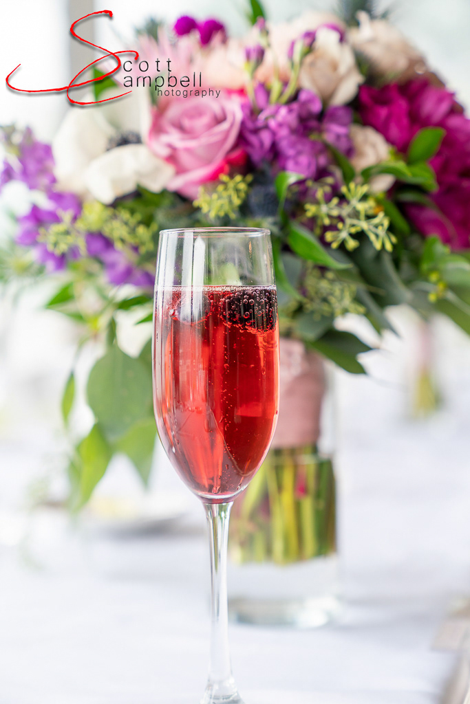 Picture of a wine glass and flowers taken by Scott Campbell Photography MT.