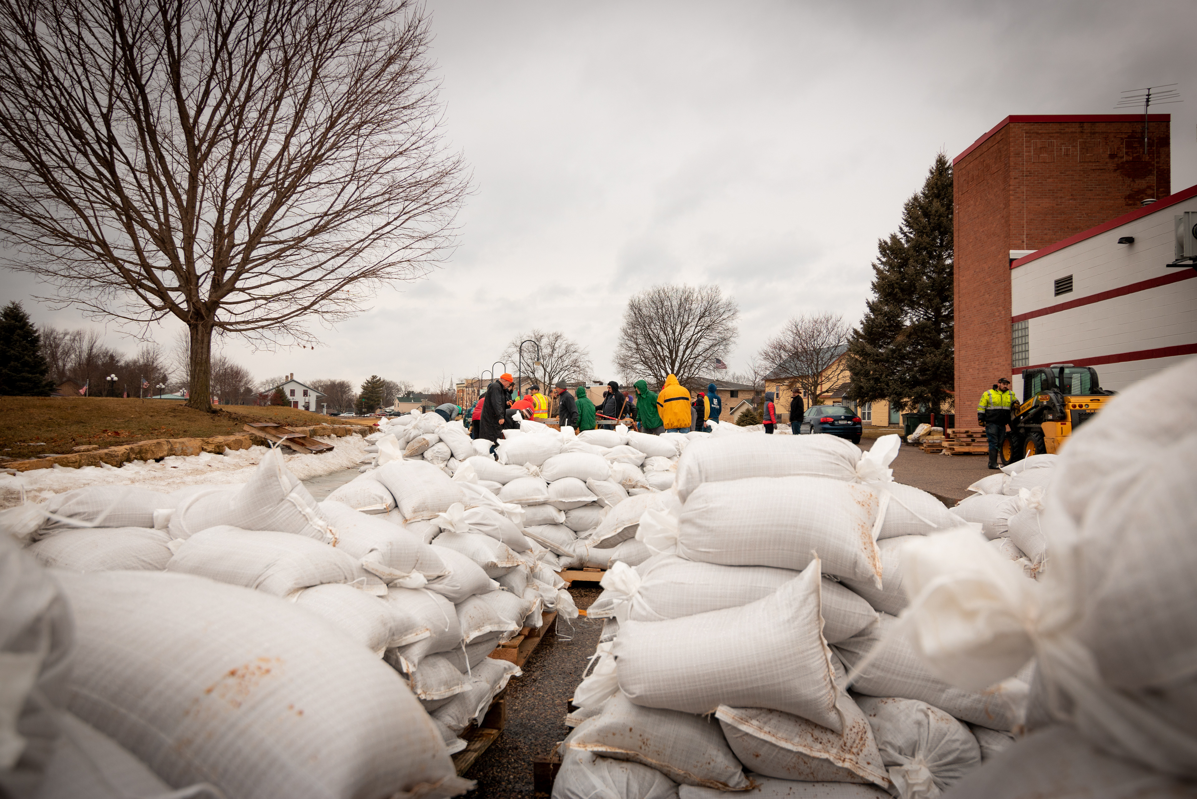 Hundreds of sandbags are stacked onto pallets ready to be dispersed to Mazomanie residents in need.