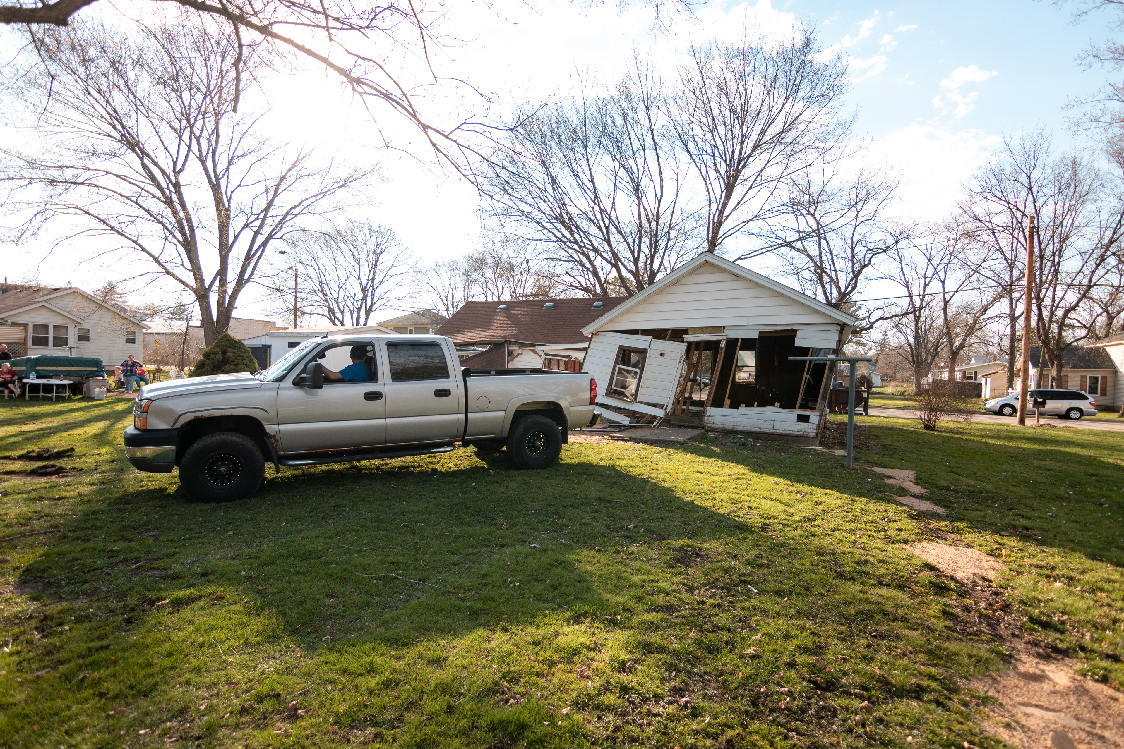 Joe Travis gets ready to pull down his parents home on April 21, 2019.