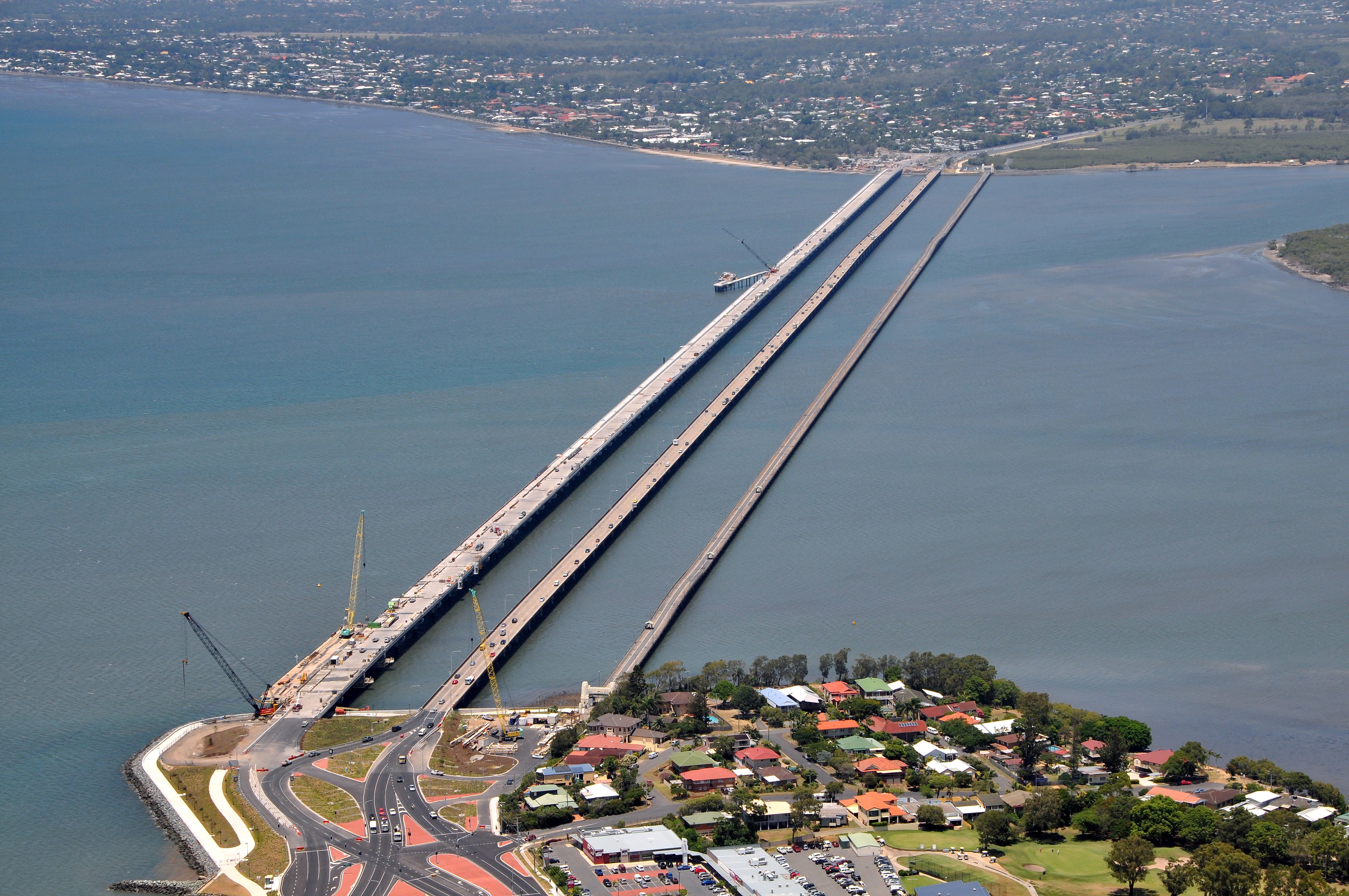 Construction of the Ted Smout Memorial Bridge underway. Looking across Bramble Bay from Redcliffe to Brighton