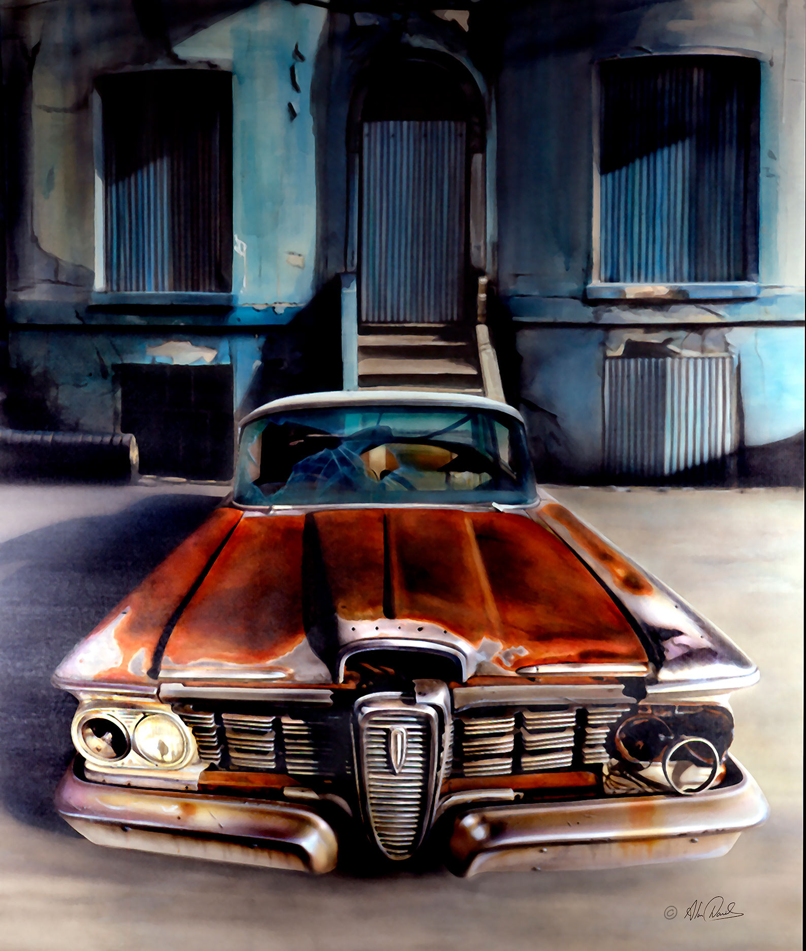 A rusted Edsel car in front of a dilapidated building.