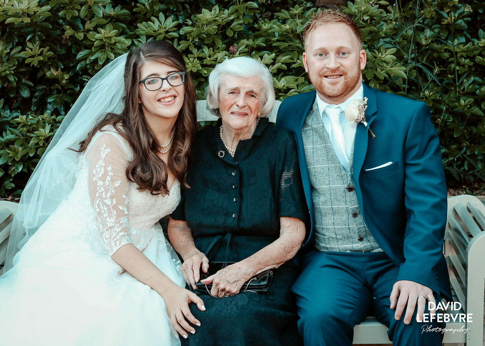 couple with grandmother at bay tree hotel wedding