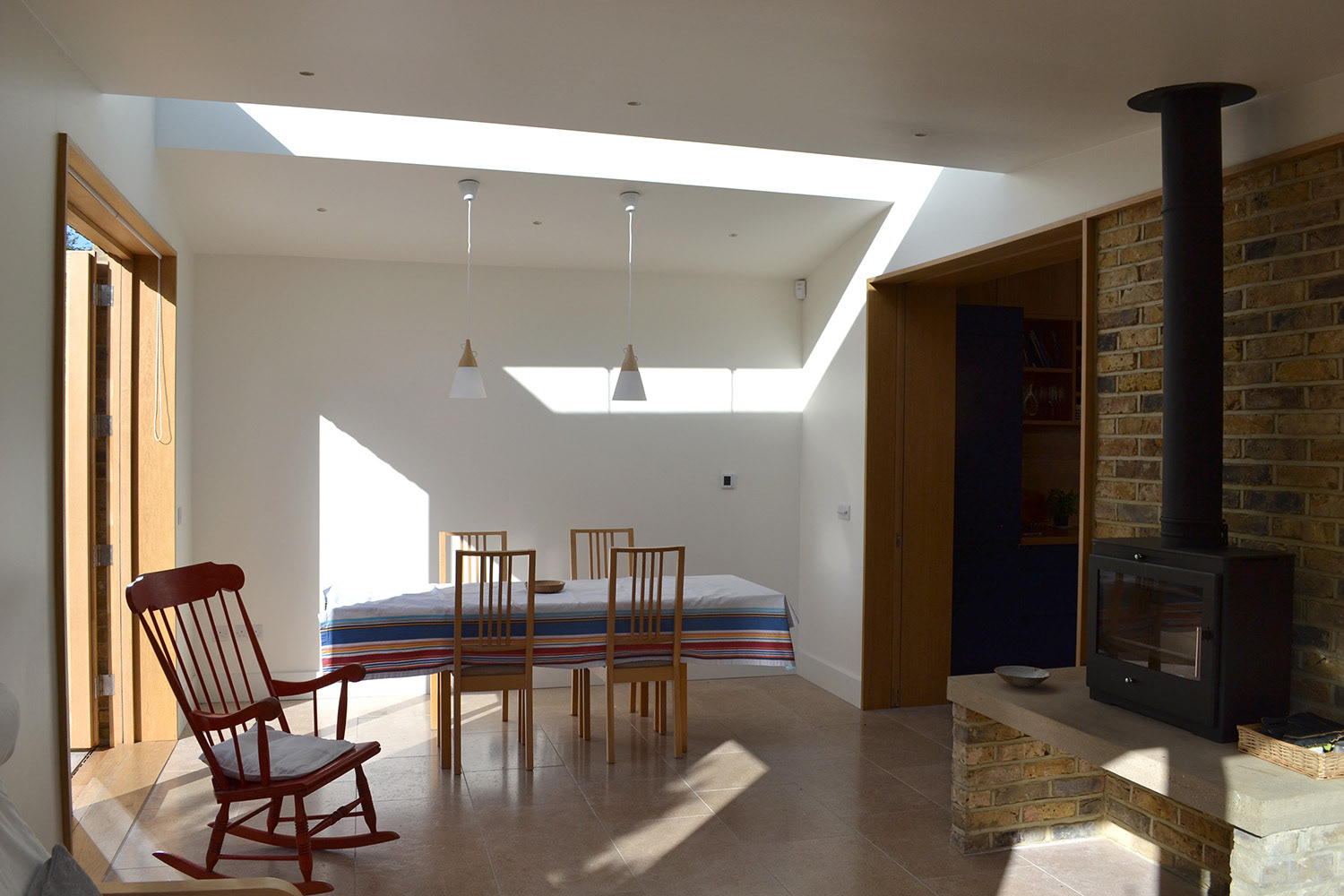 Garden room extension with wood stove