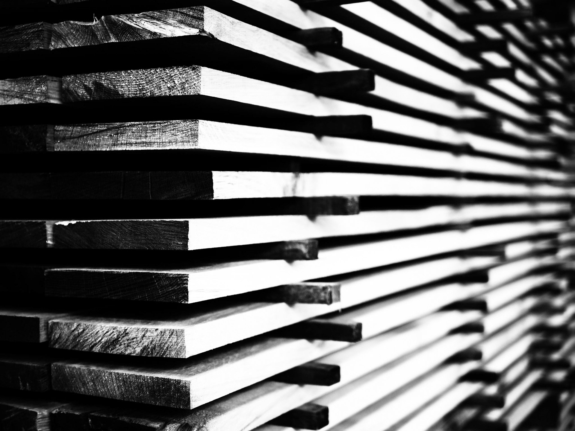 Timber planks sticked and stacked for air drying