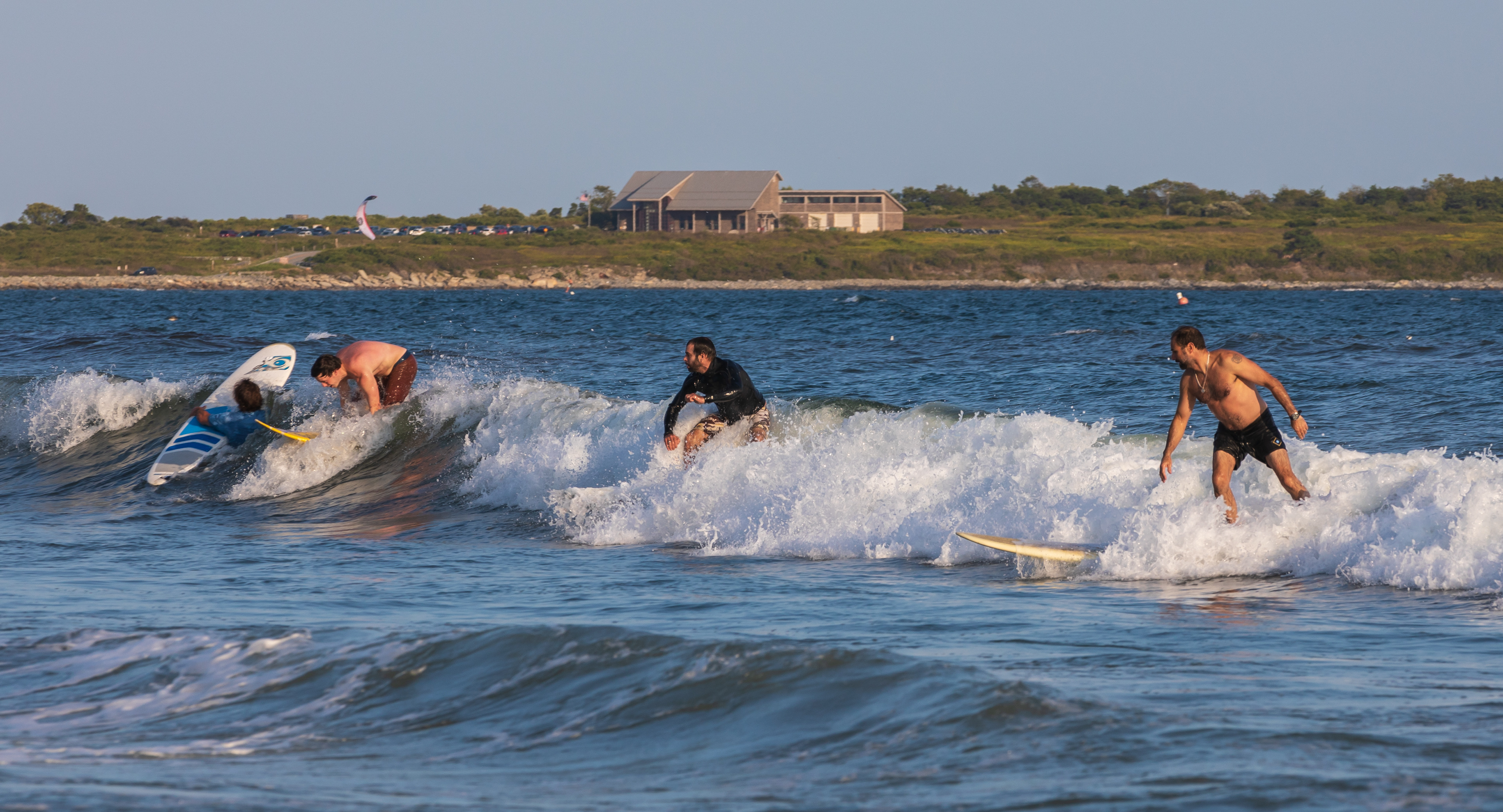 Surfers colliding at Second Beach, Middletown RI, Aug 28, 2020