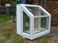 Garden window with glass shelf.