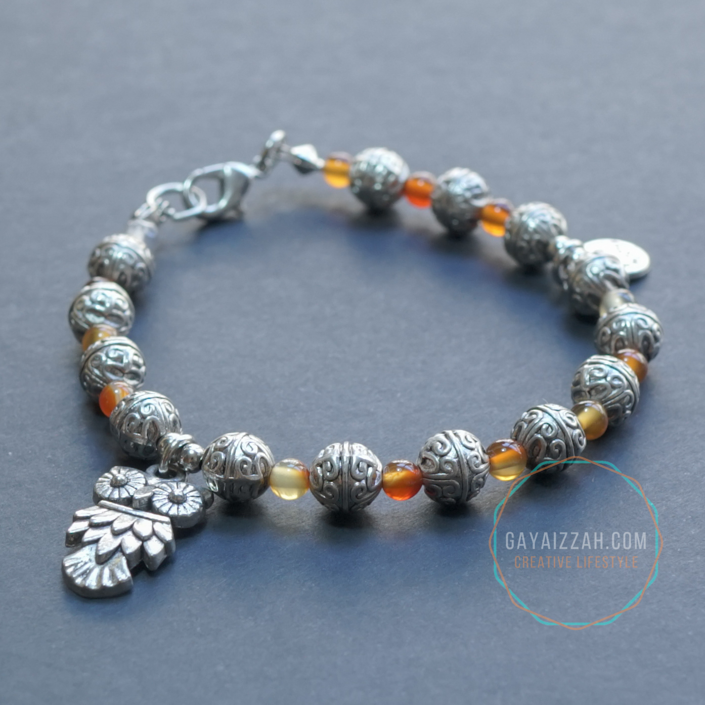 Rm20: Agate and rhodium plated steel