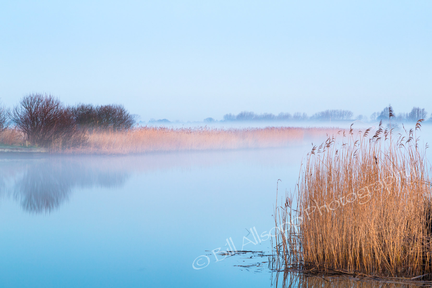 A tranquil dawn on the River Thurne in the Norfolk Broads.