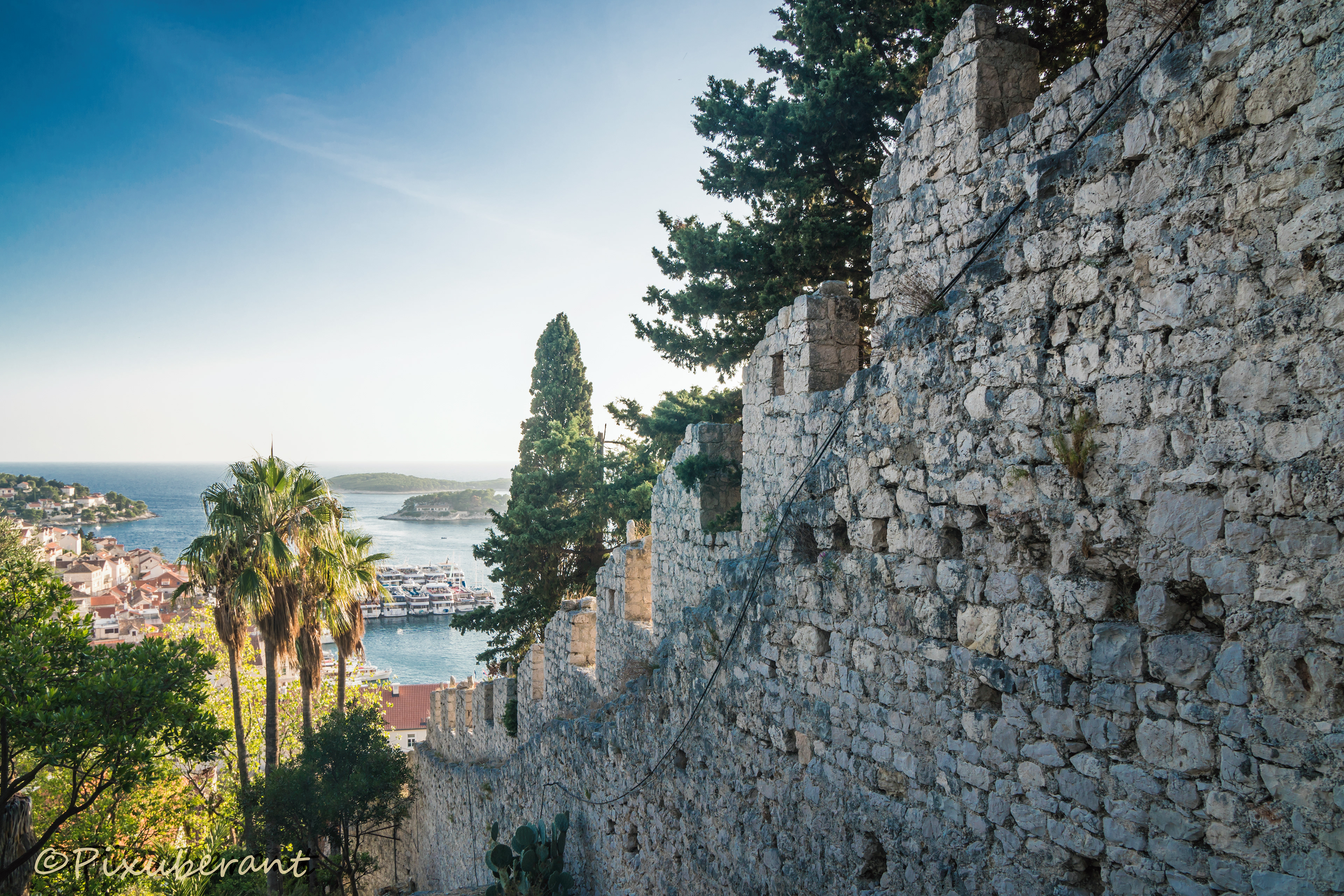 Hvar fortress walls and the Katarina cruise boats at the harbour