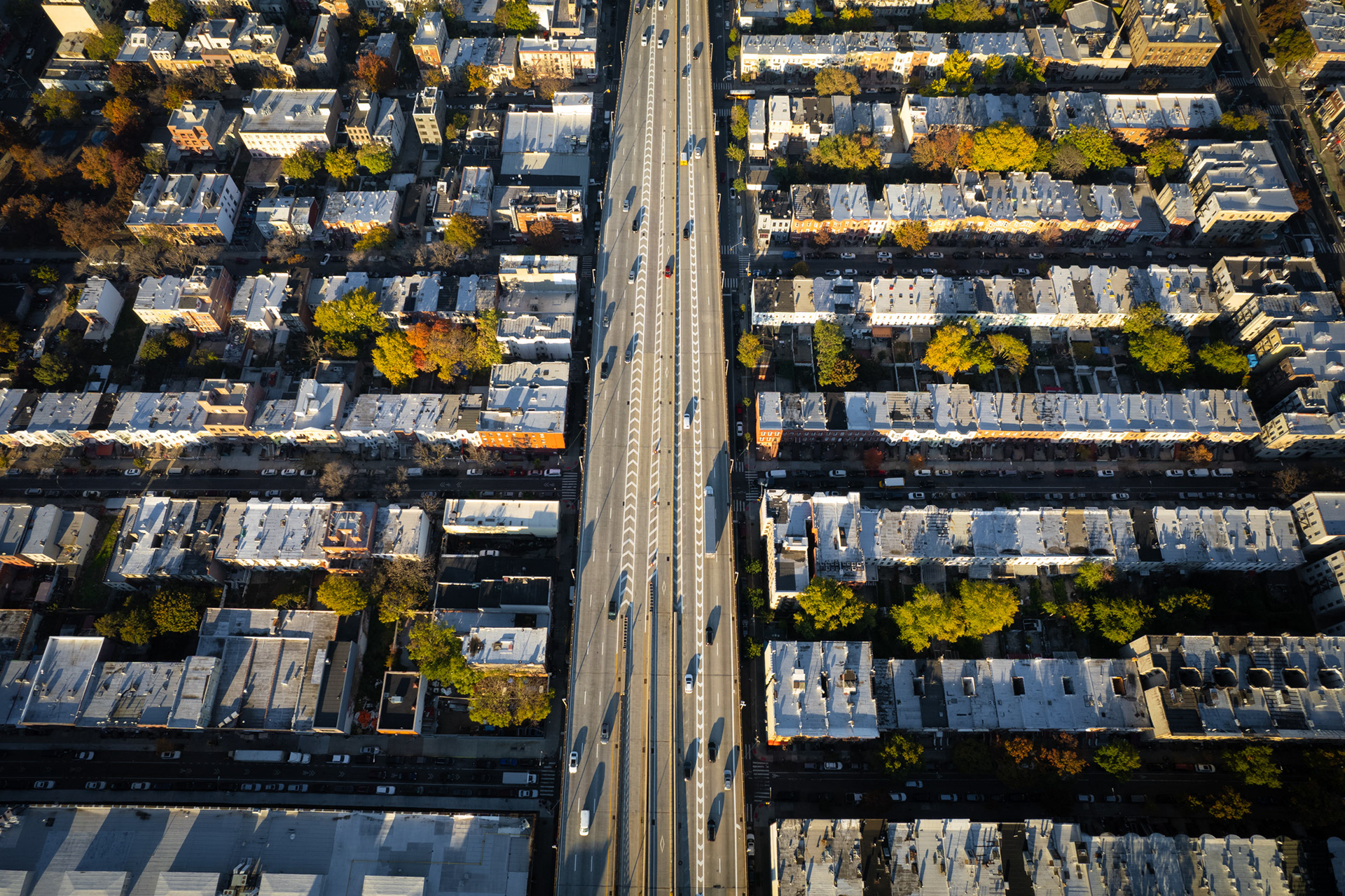 Autumn in New York City in Brooklyn over a highway.