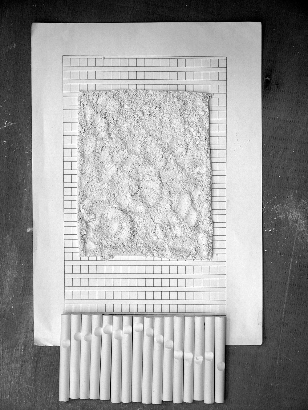 sculpture using chalk and manuscript paper